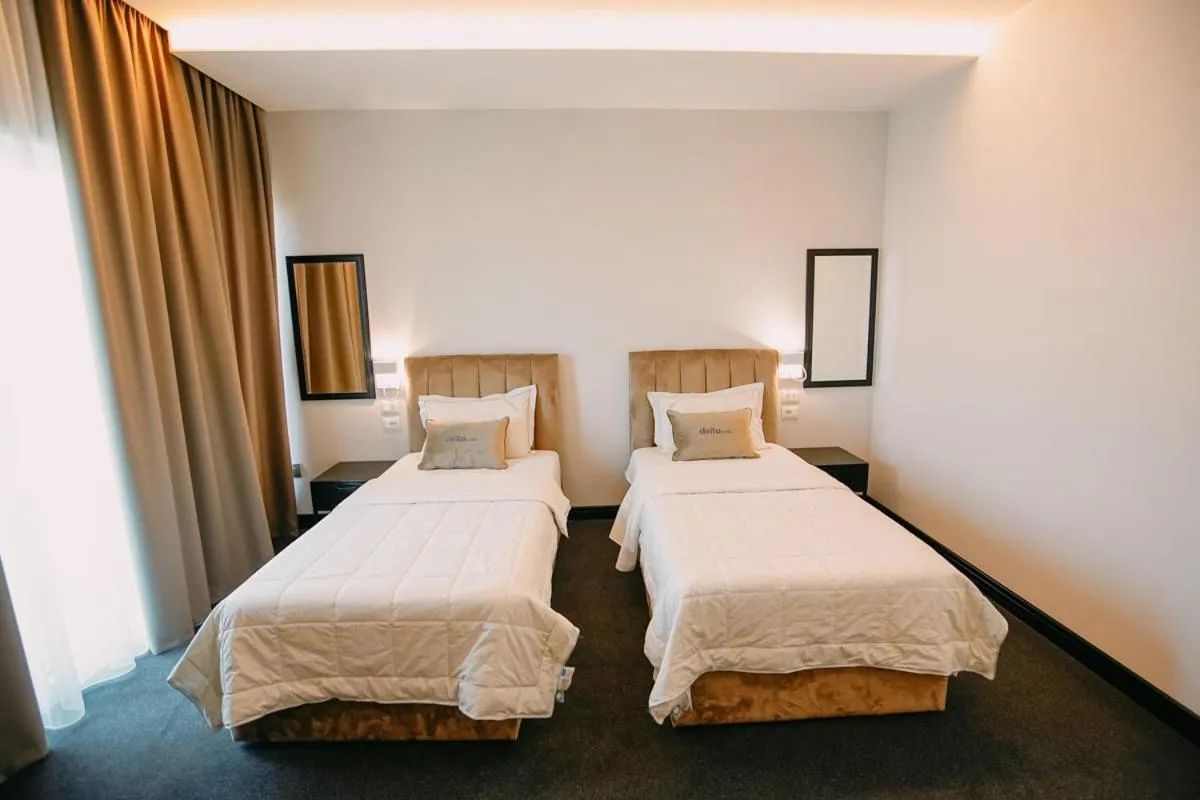 Bed in Hotel Delta Premium