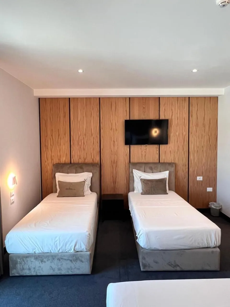 Bed in Hotel Delta Premium