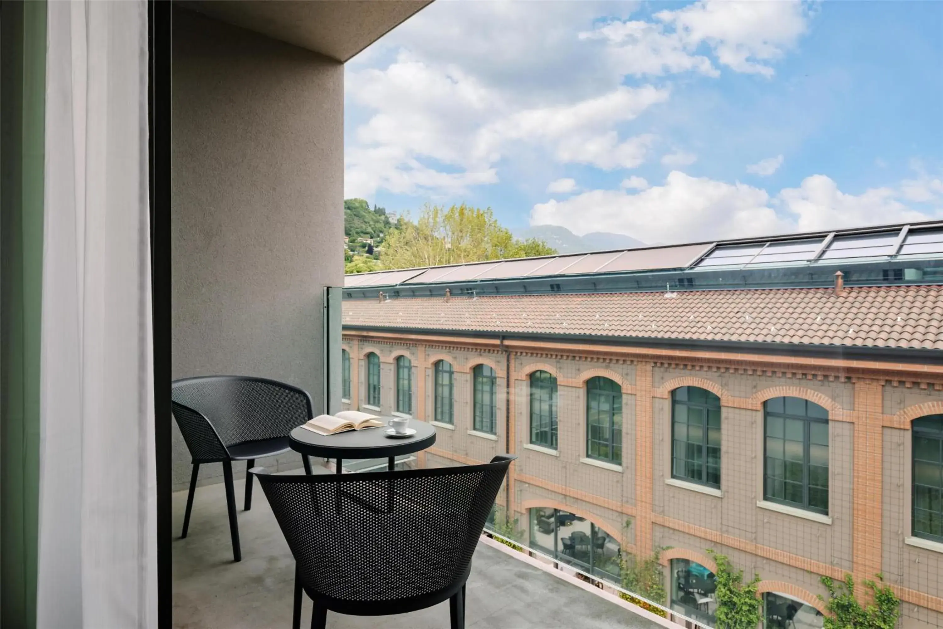 Deluxe King Room with Patio in Hilton Lake Como Deluxe King Room with Patio in Hilton Lake Como