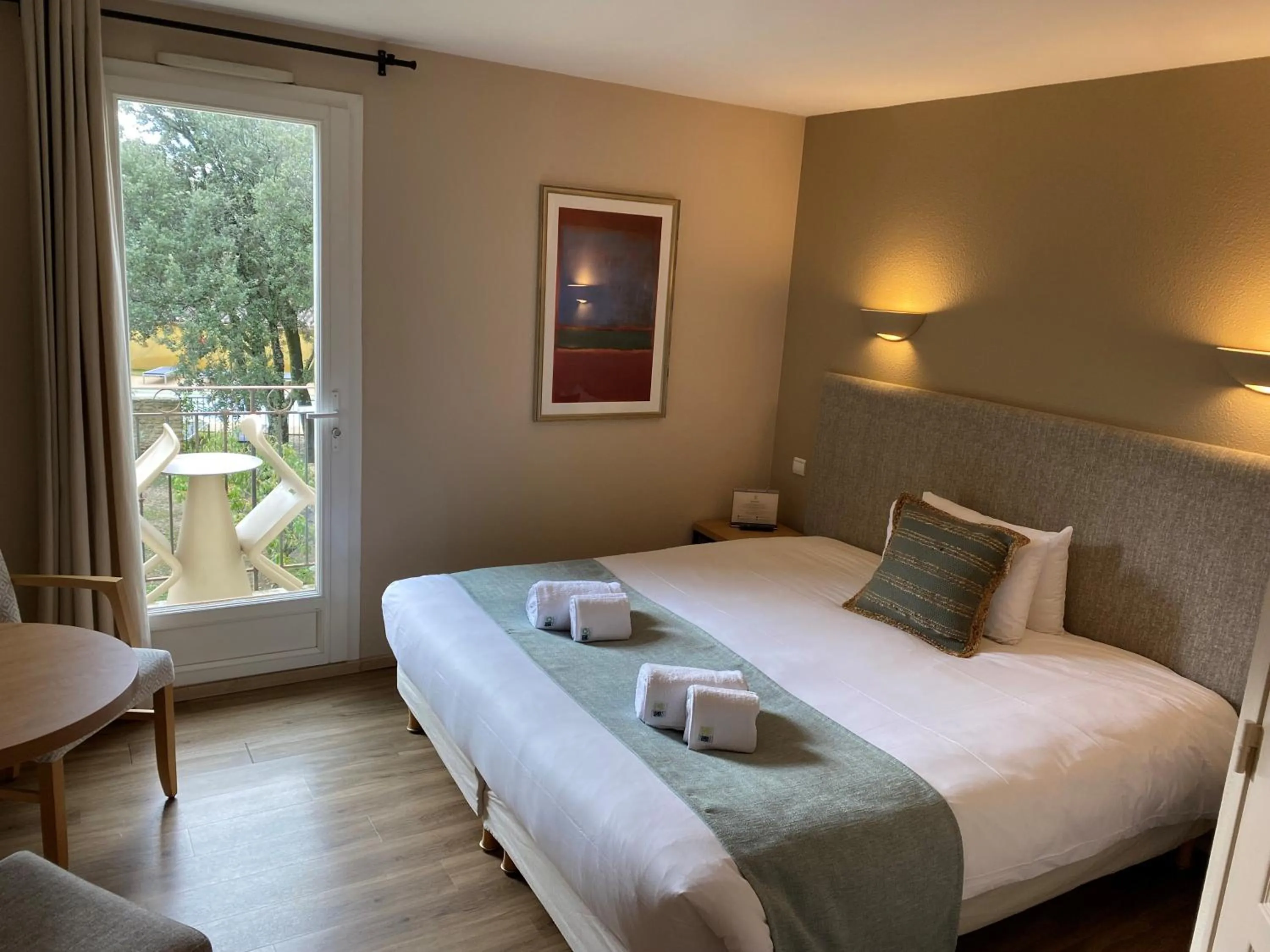 Balcony/Terrace, Bed in Logis Hôtel La Bastide De Grignan & Restaurant "La Chênaie"