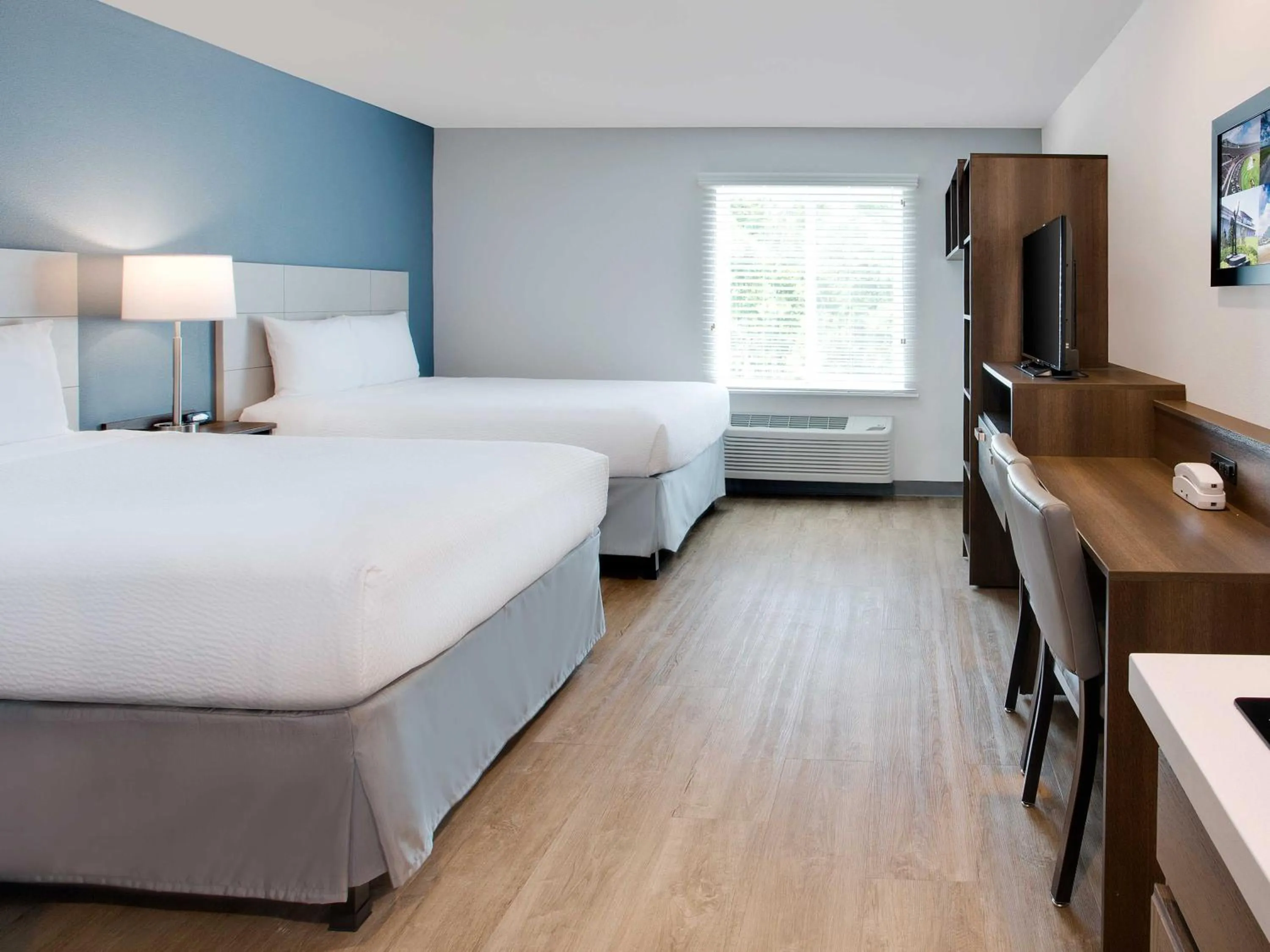 Photo of the whole room, Bed in WoodSpring Suites Daytona Beach Int'l Speedway