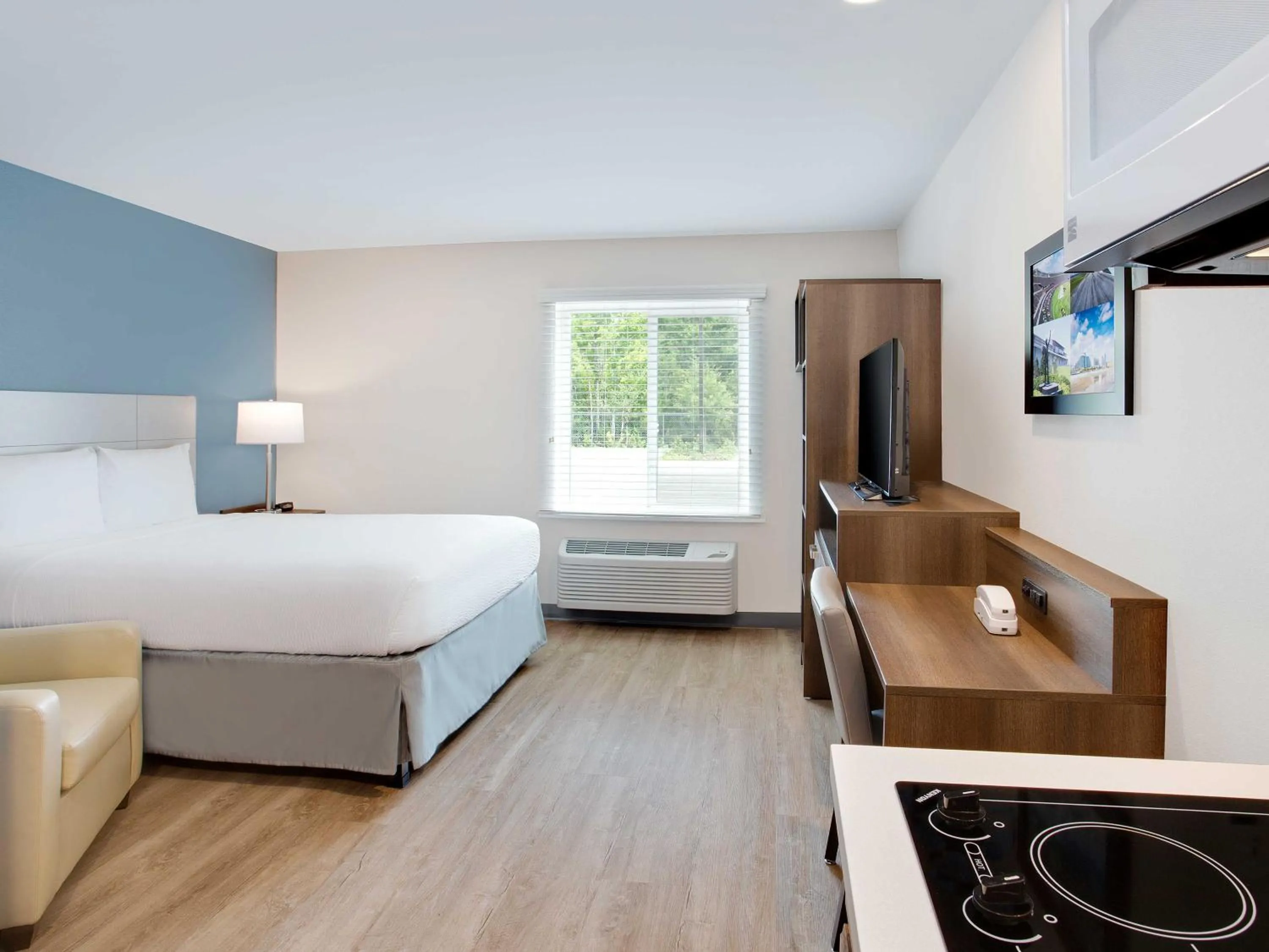 Photo of the whole room, Bed in WoodSpring Suites Daytona Beach Int'l Speedway