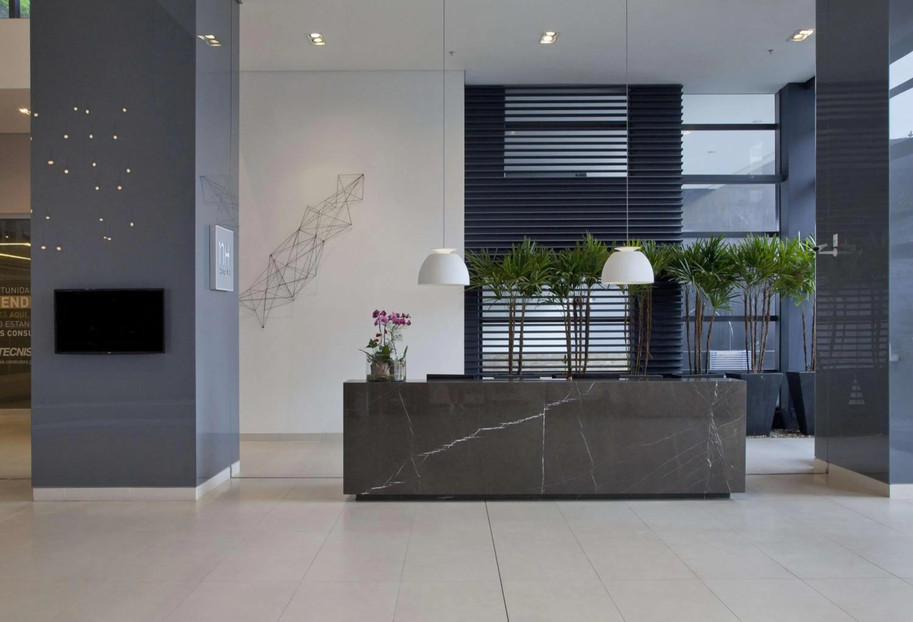 Lobby or reception in NH Collection Curitiba