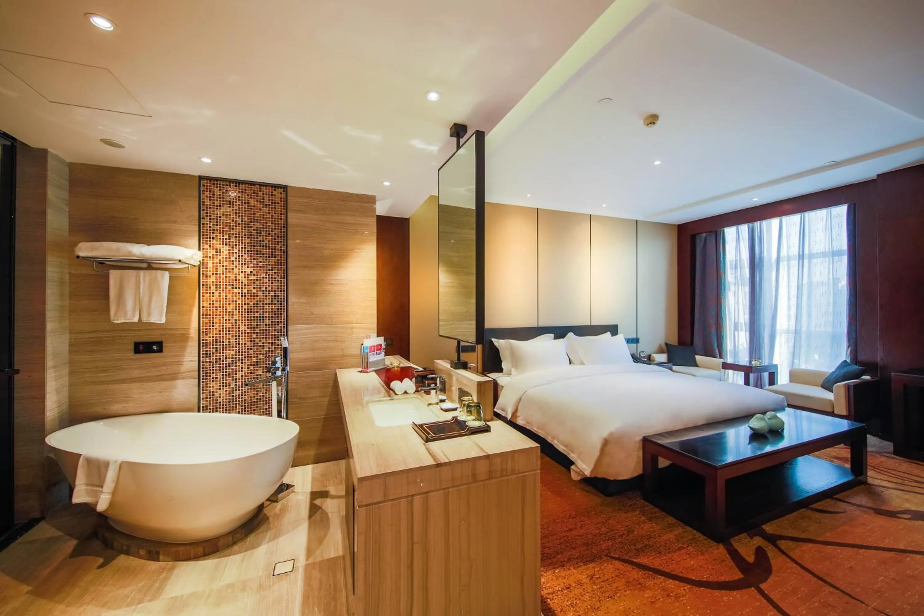 Bathroom, Bed in Yantai Meiya International ApartHotel (Previous Ramada Plaza)