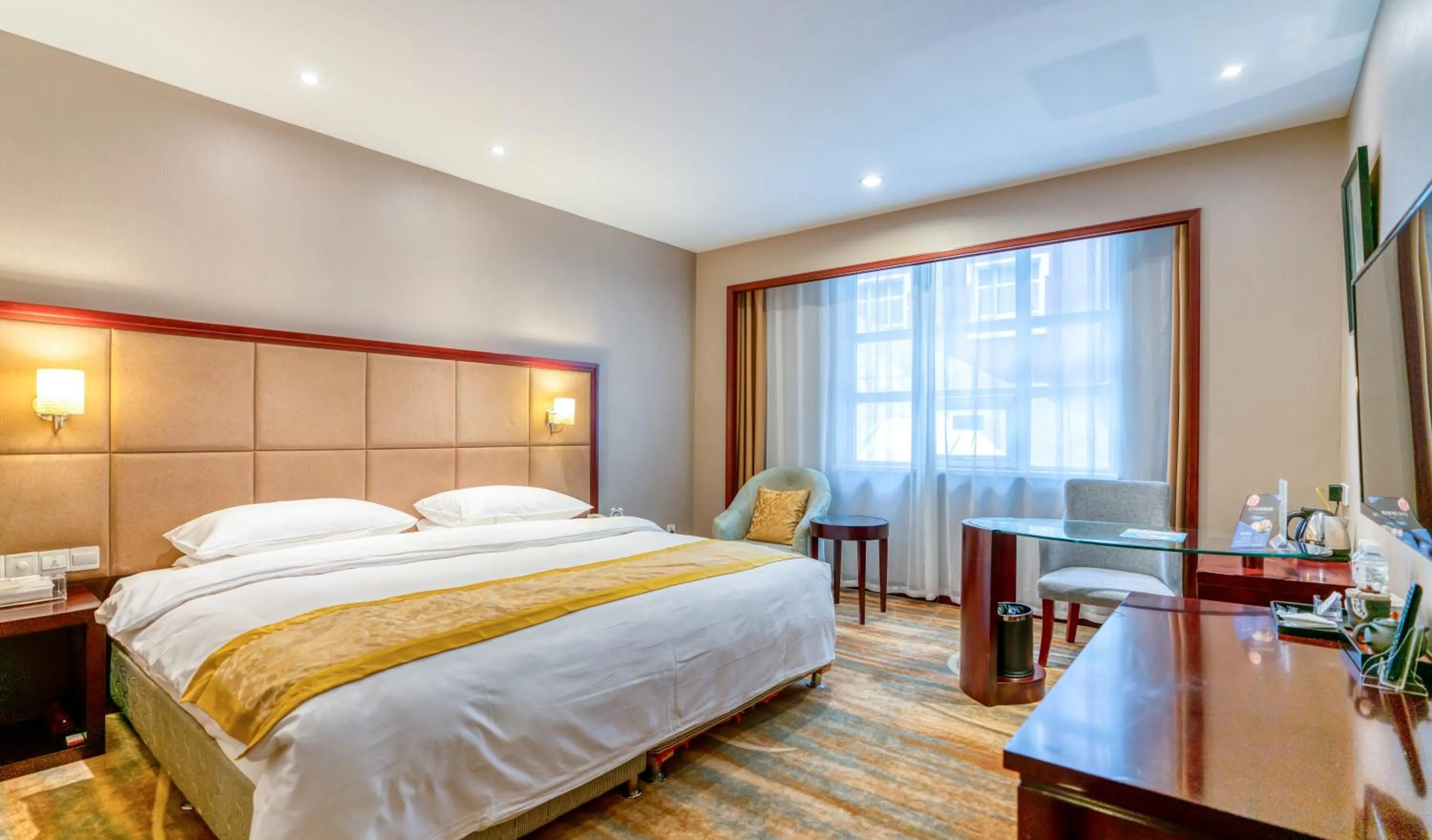 Bed in Yantai Meiya International ApartHotel (Previous Ramada Plaza)