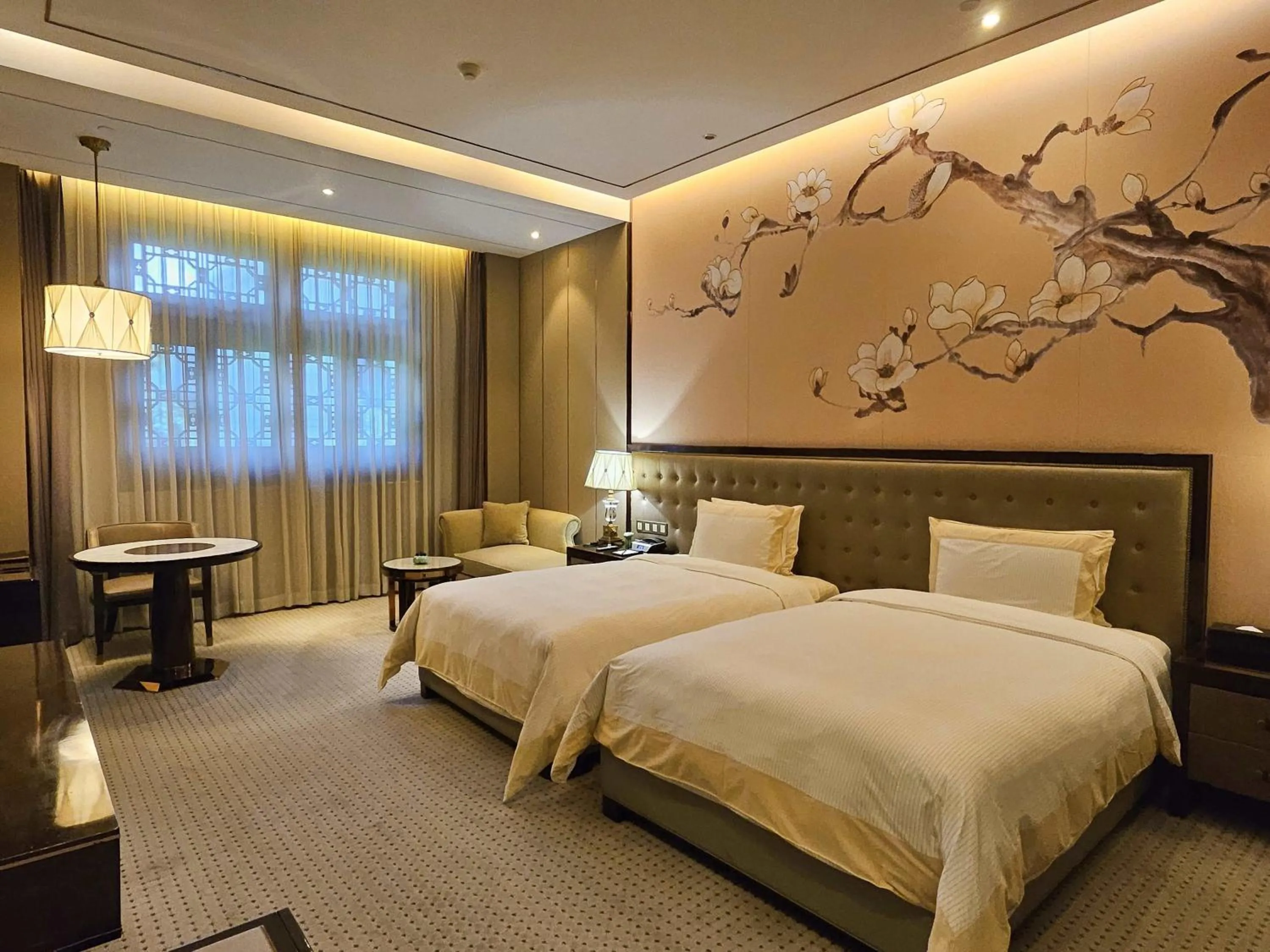 Seating area, Bed in Royal Garden Hotel Shanghai-Free Shuttle to and From Disney & PVG & close Metro Line2 easy to SHA New Expo