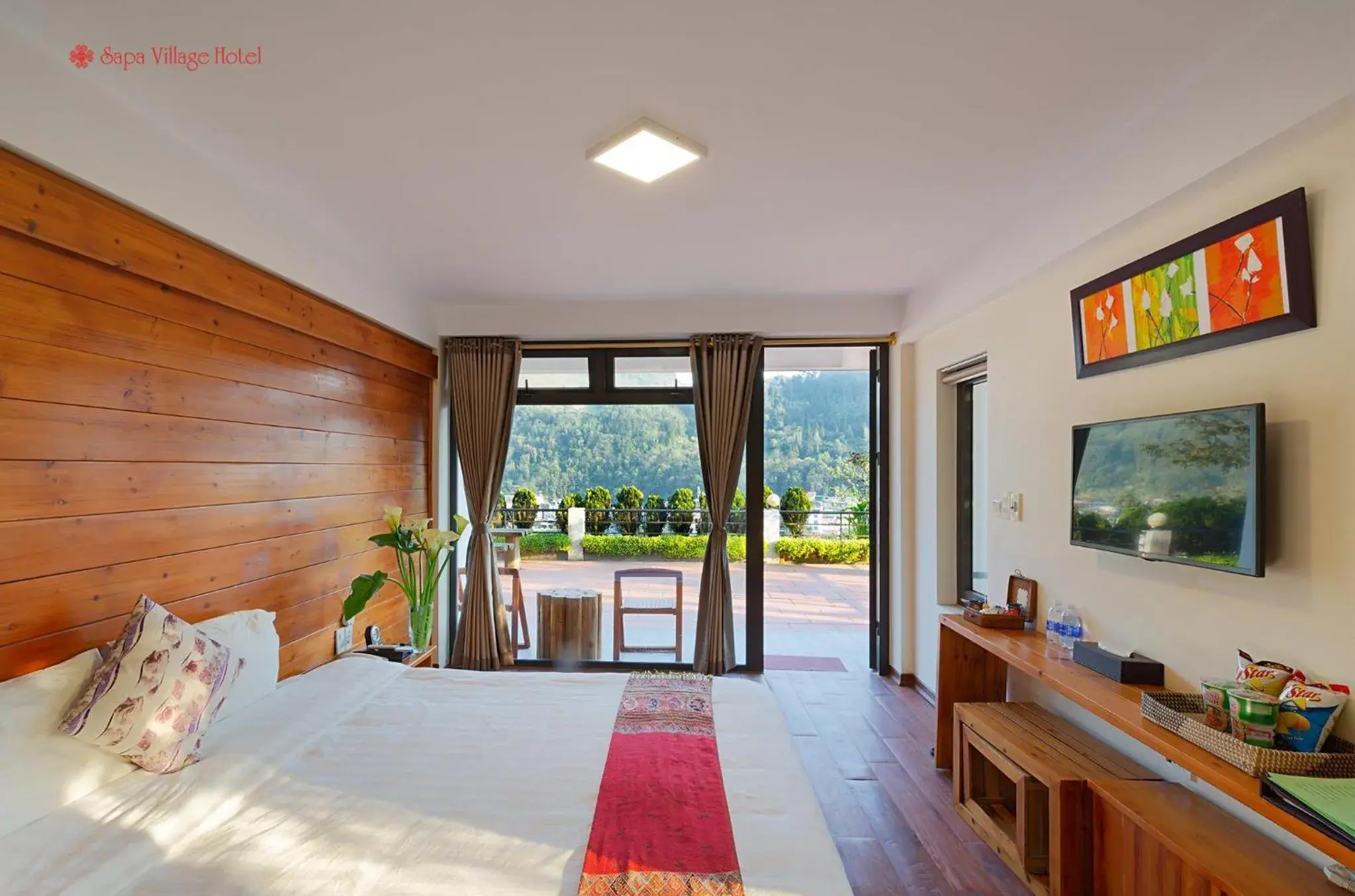 Deluxe Double Panoramic City View with Terrace in Sapa Village Hotel Deluxe Double Panoramic City View with Terrace in Sapa Village Hotel