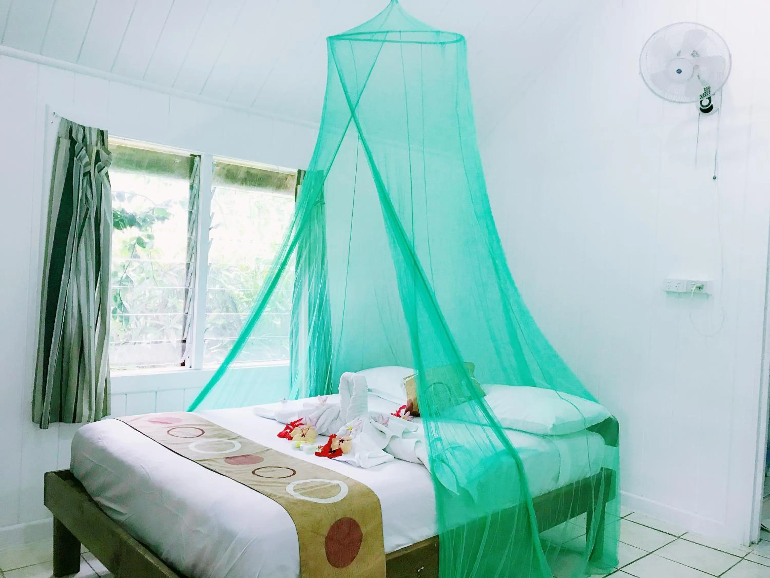 Bed in Tanna Evergreen Resort & Tours