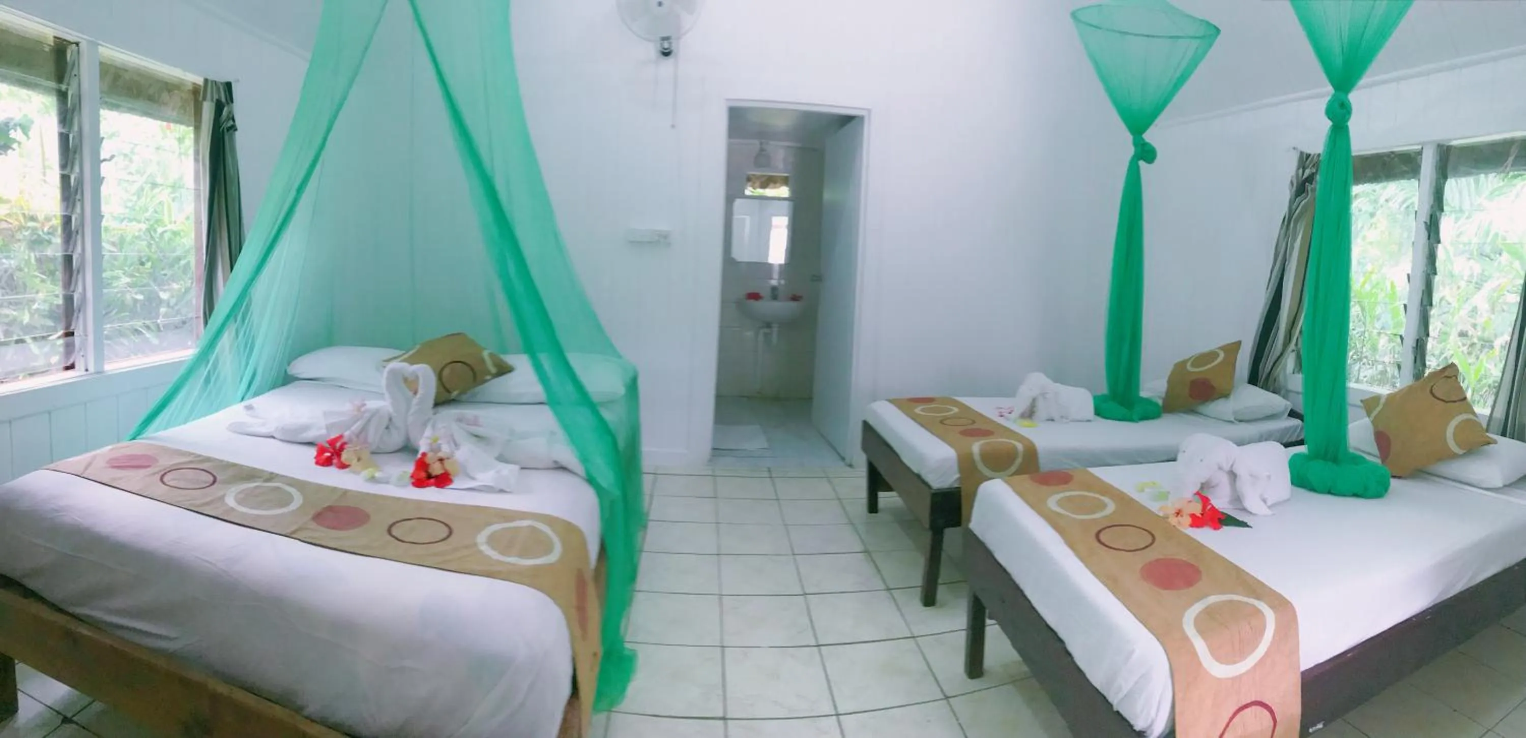 Bed in Tanna Evergreen Resort & Tours