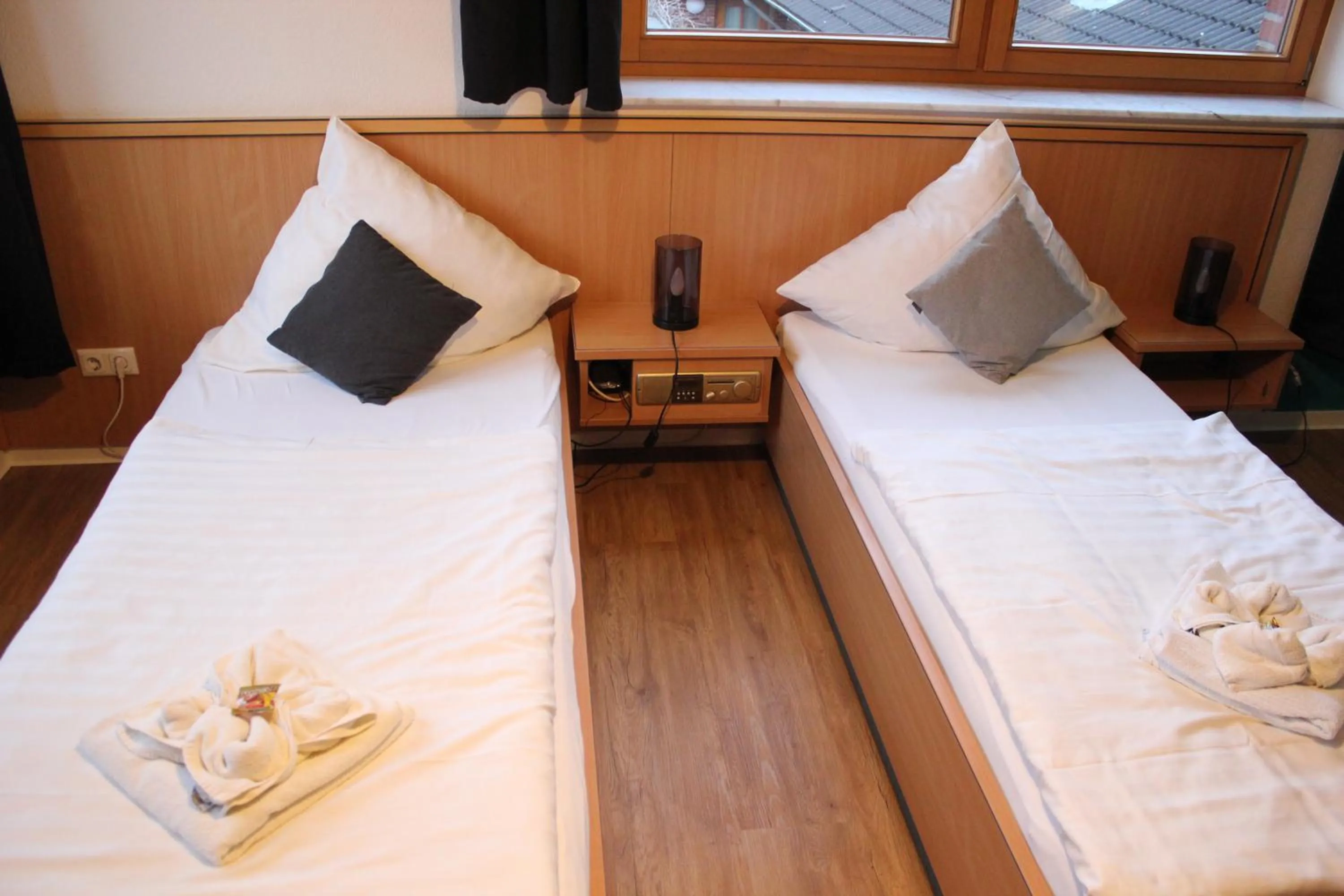 Bed in Olympia Hotel & Restaurant