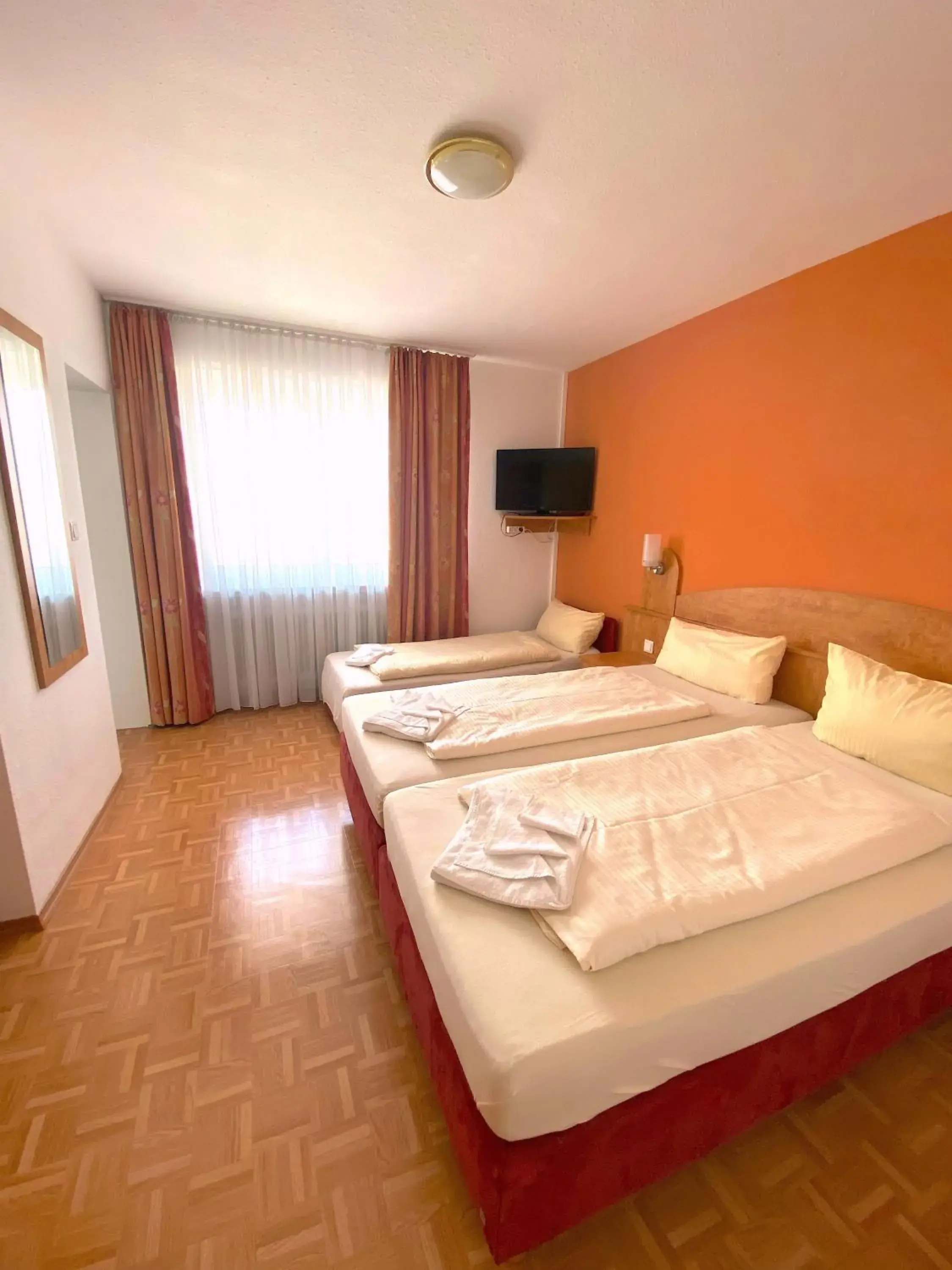 Triple Room in Hotel Gasthof Rose Triple Room in Hotel Gasthof Rose