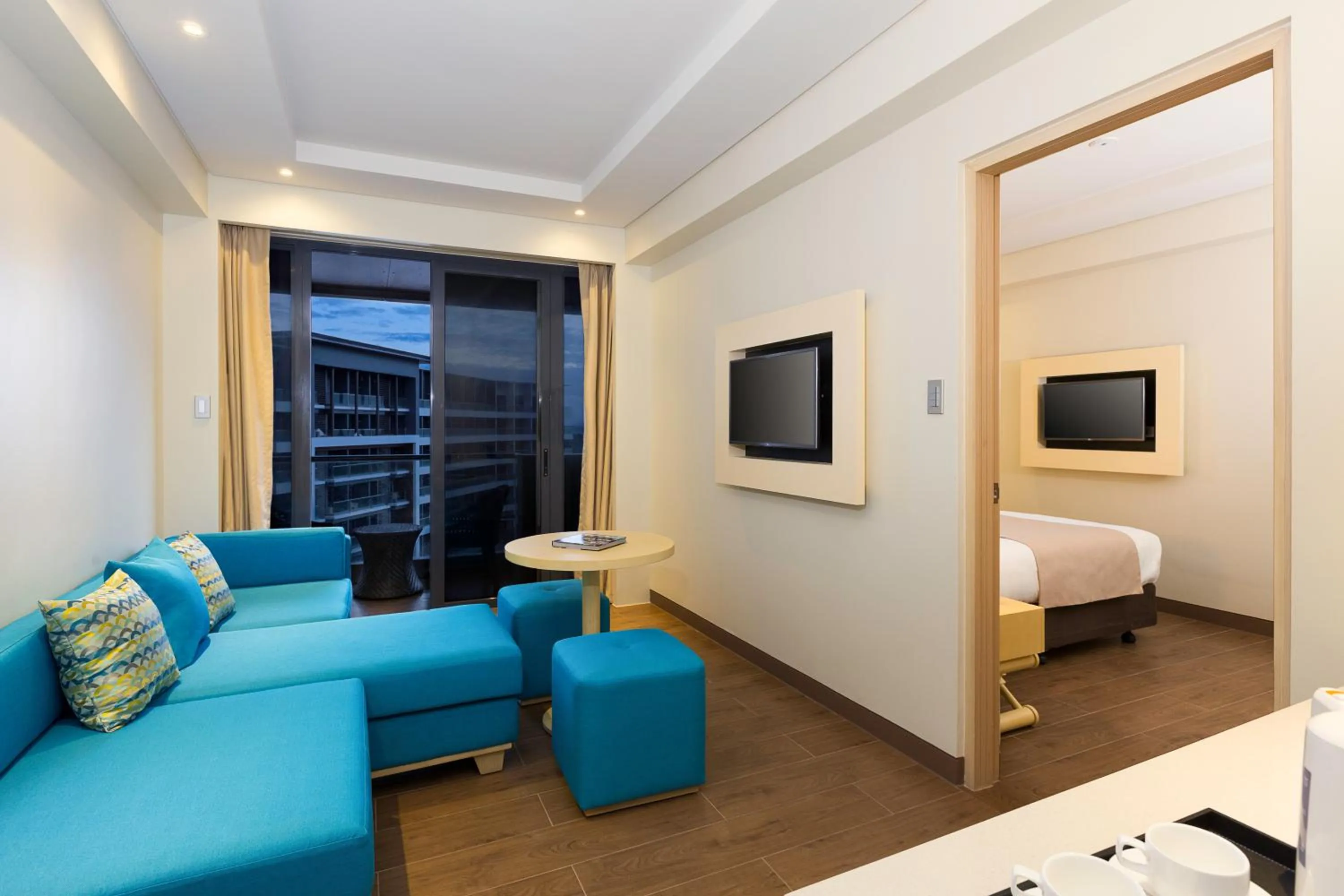 TV and multimedia, Bed in Savoy Hotel Boracay near Newcoast Beach