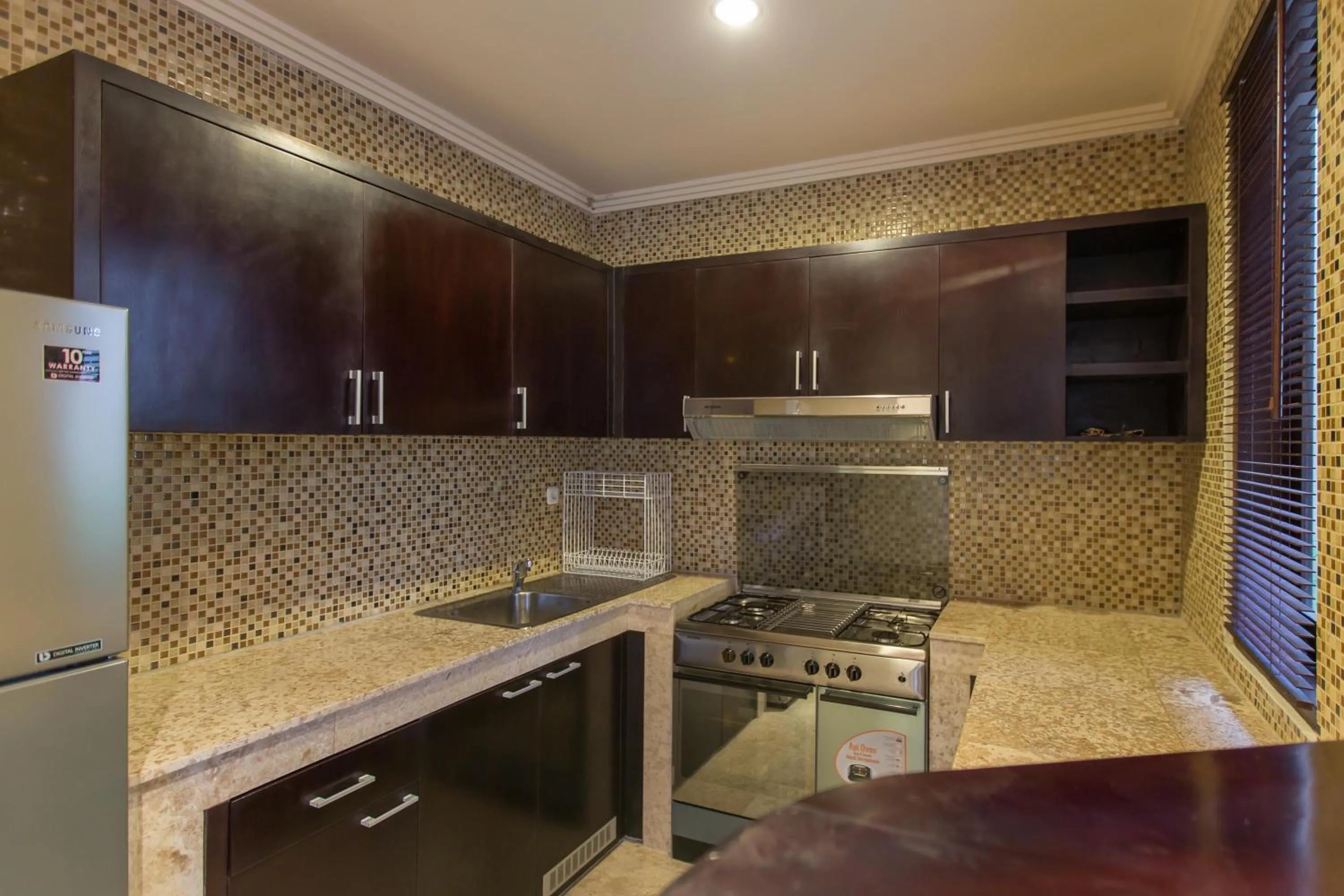 Kitchen or kitchenette in The Reika Villas by Nagisa Bali