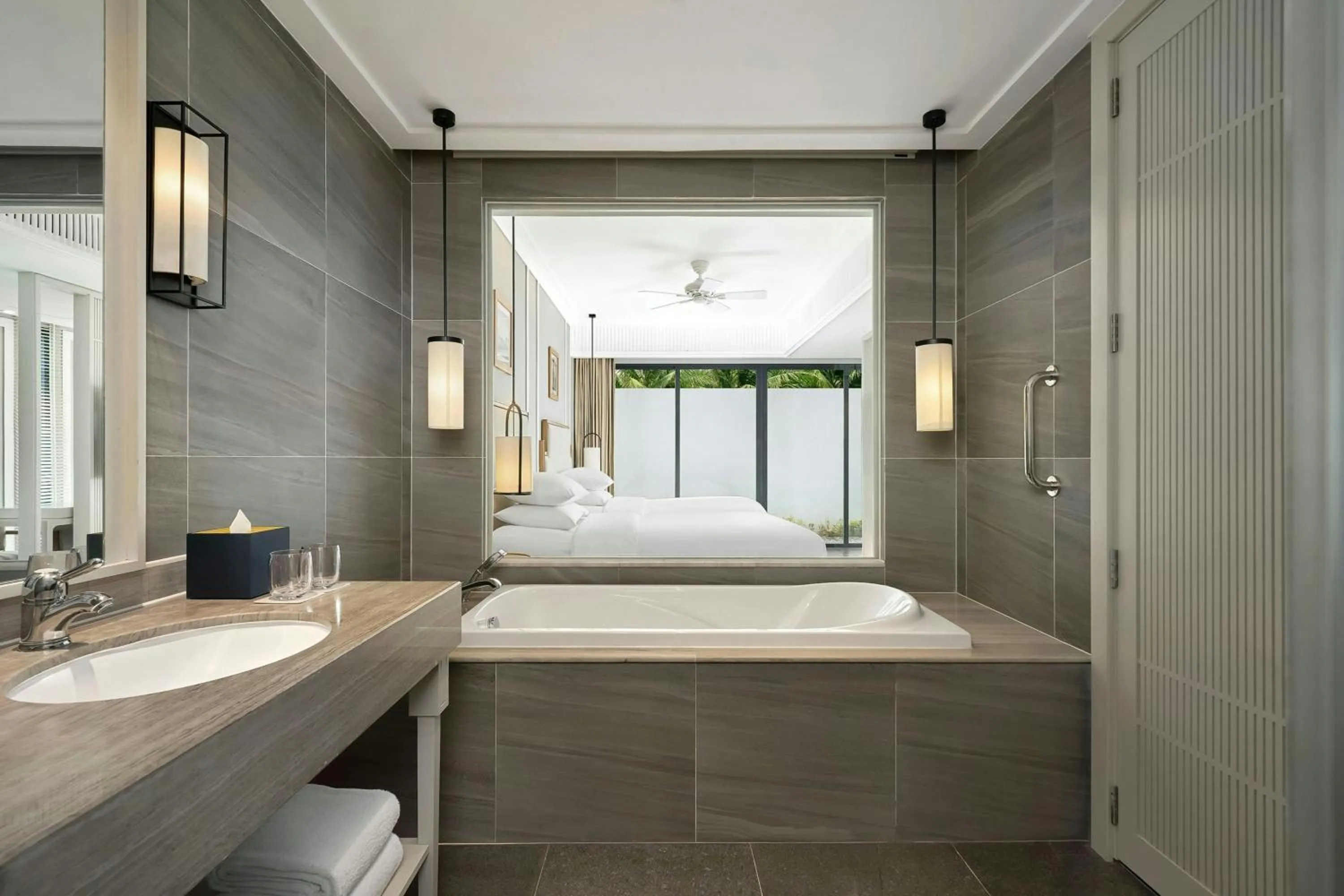 Bathroom, Bed in Renaissance Danang Hoi An Resort & Spa