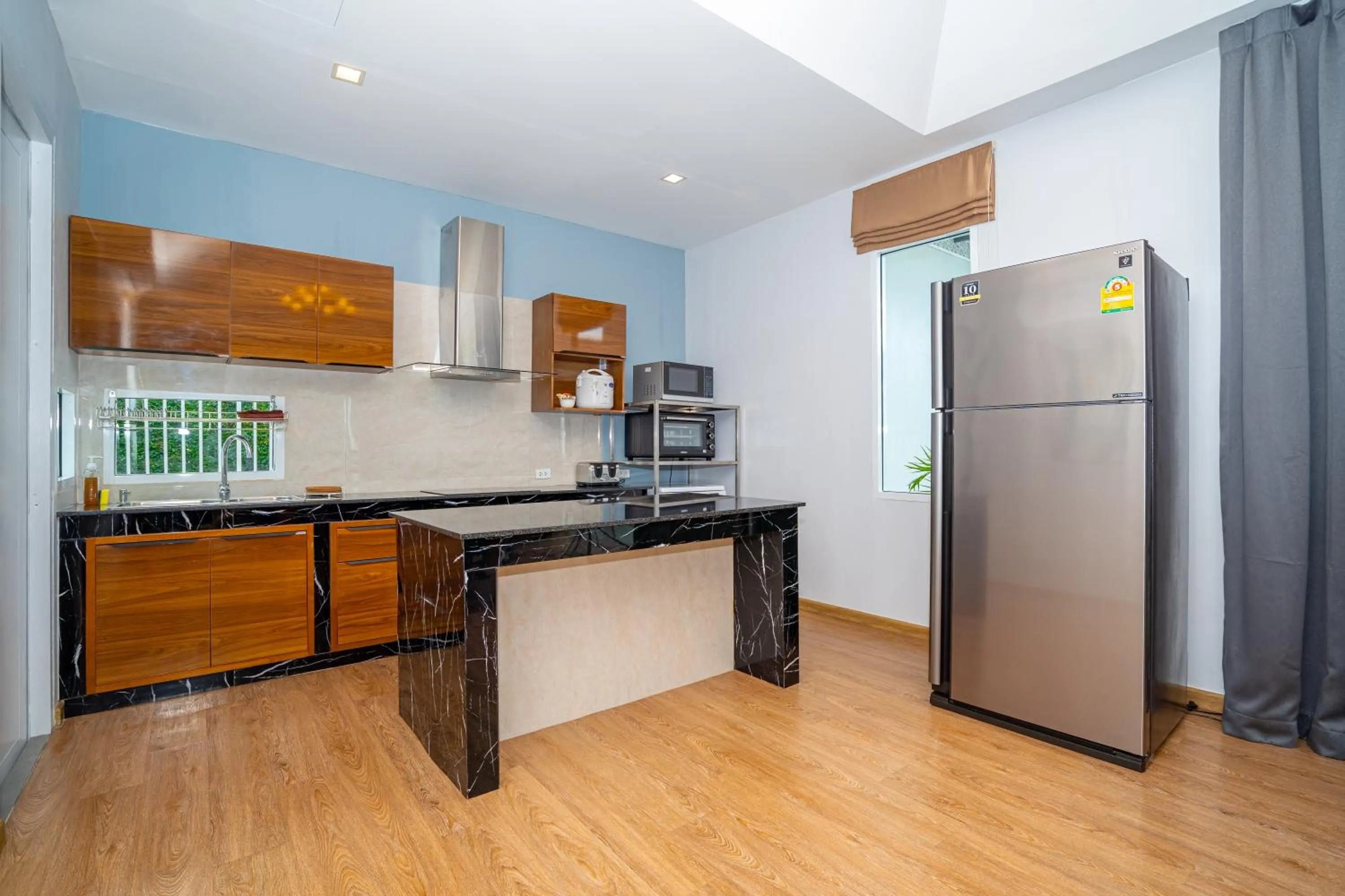 Kitchen or kitchenette in The Orchid Villa
