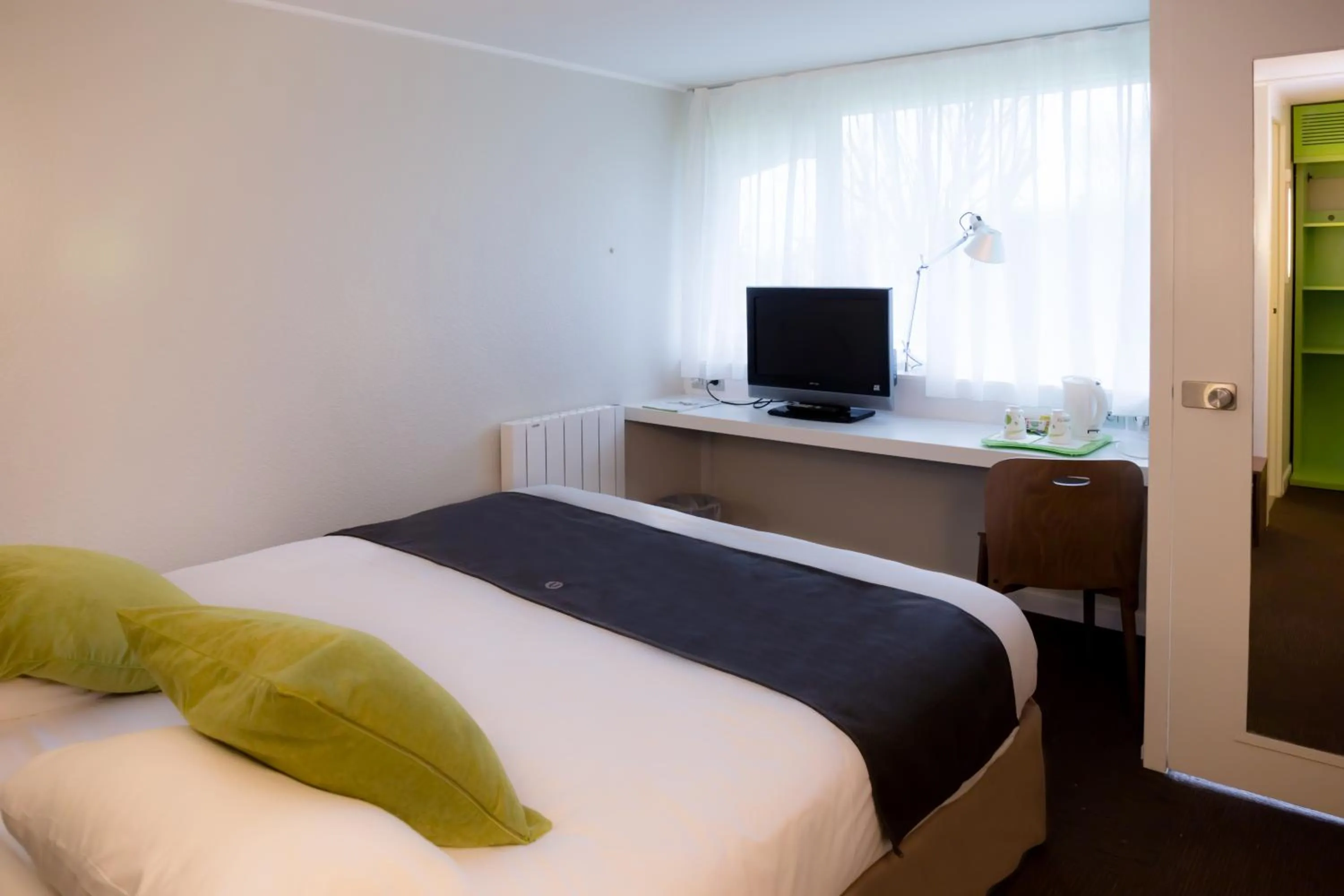 Bedroom, Bed in Hotel inn Design Laval