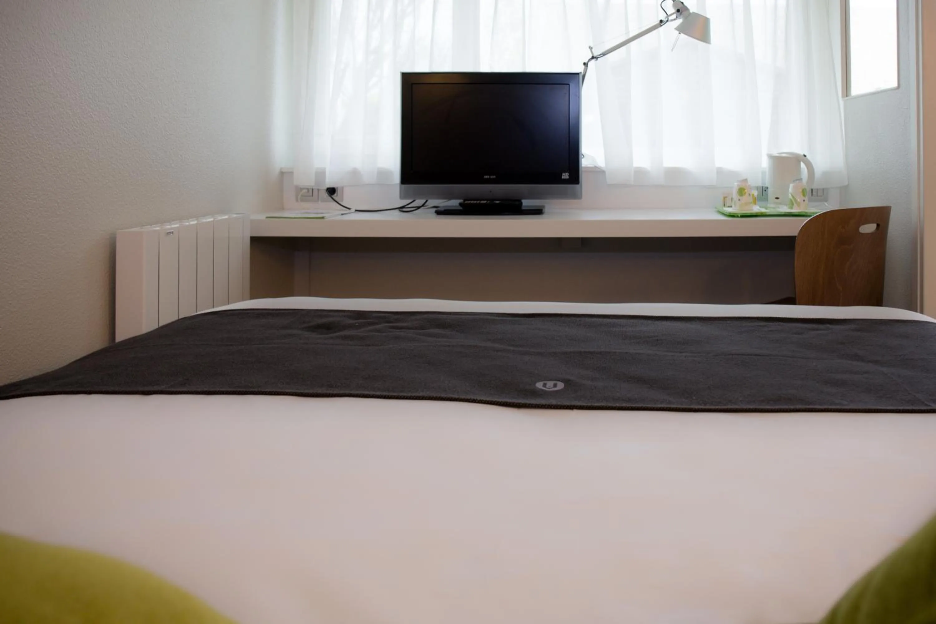 Bedroom, Bed in Hotel inn Design Laval