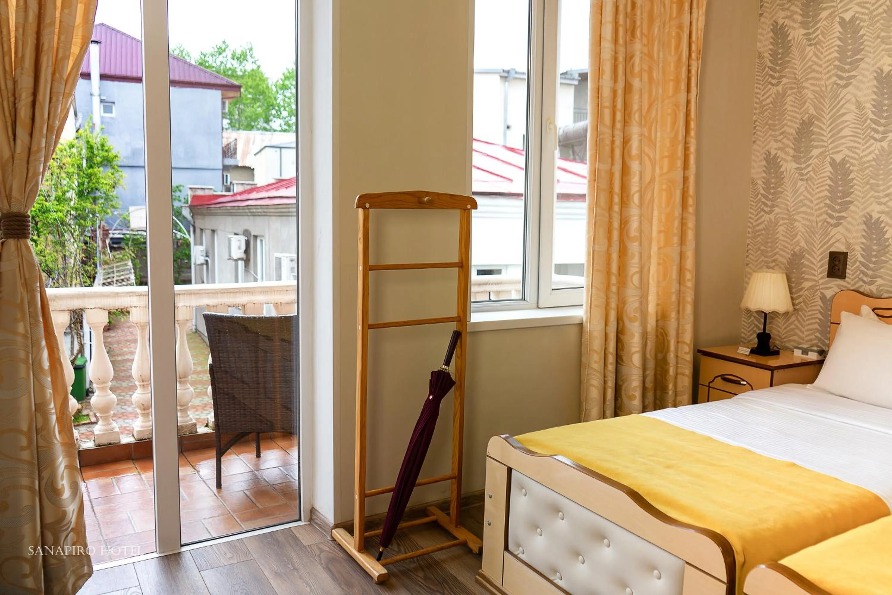 Bed in Sanapiro Hotel