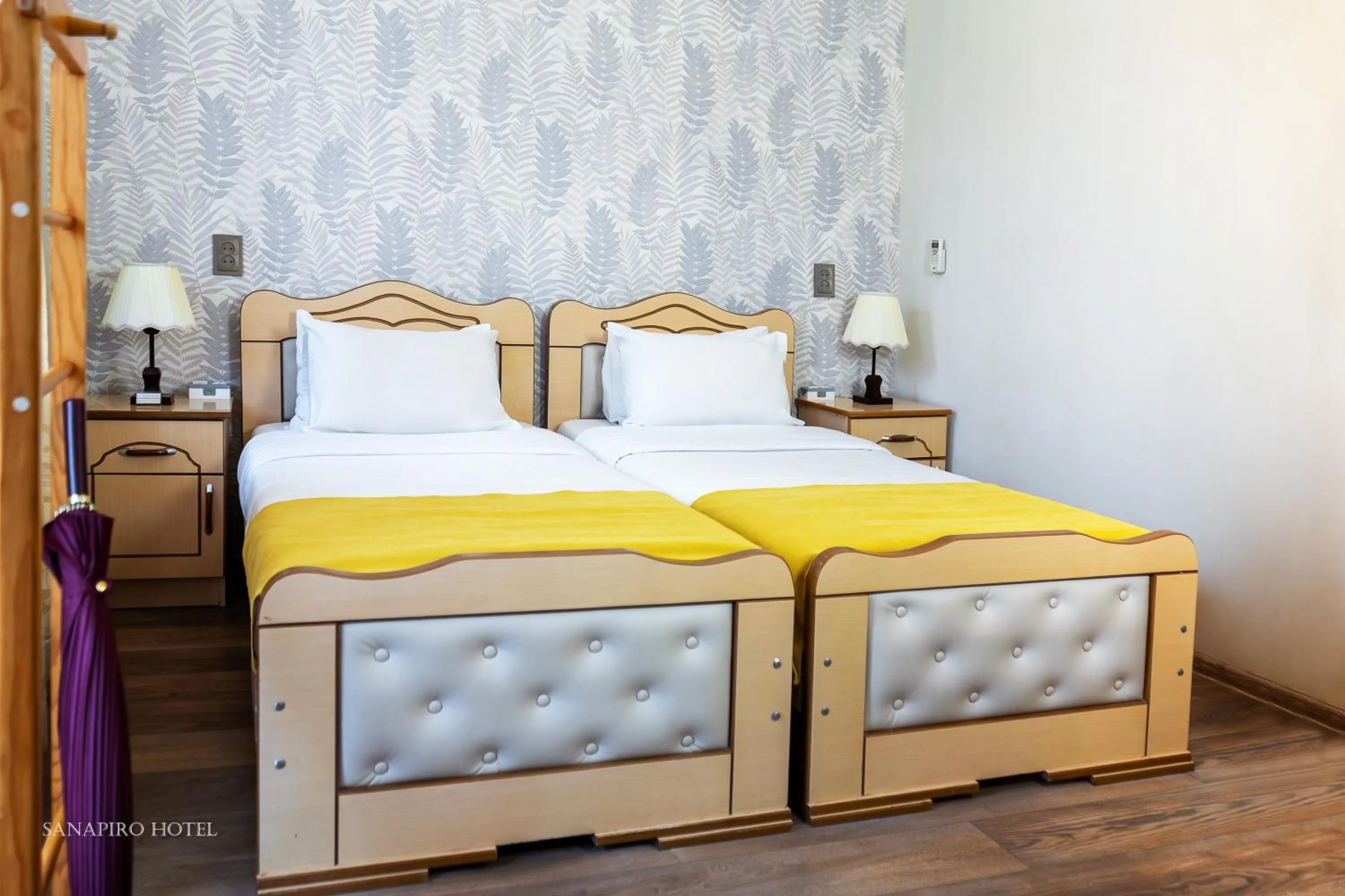 Bed in Sanapiro Hotel