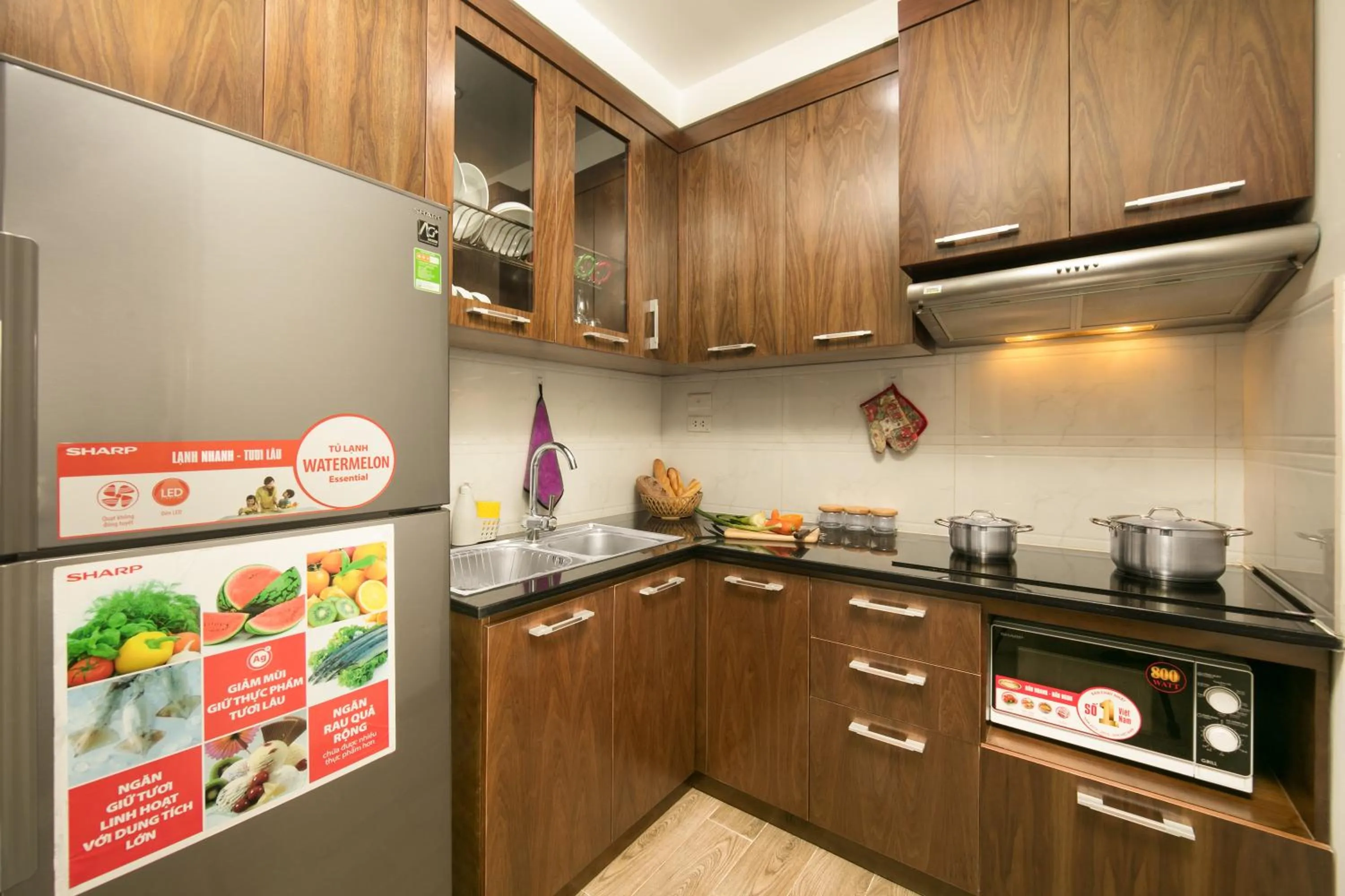 Kitchen or kitchenette in Poonsa Hanoi - The Ordinary Living