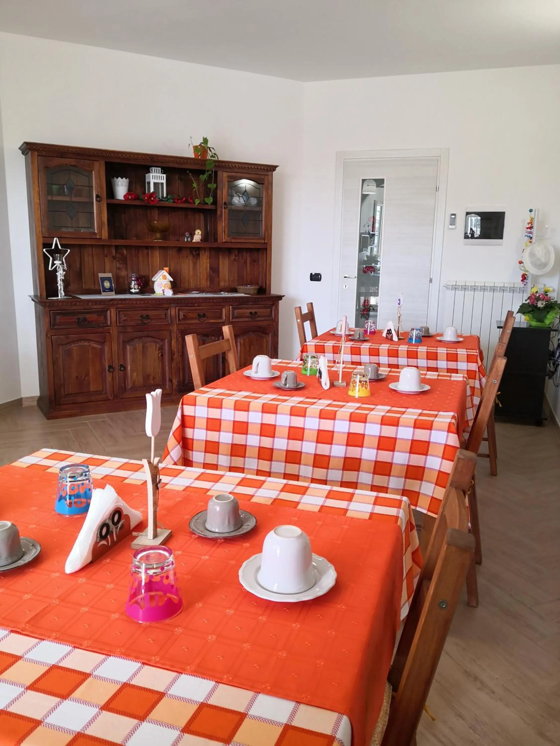 Communal lounge/ TV room in B&B Il Papavero Rosso