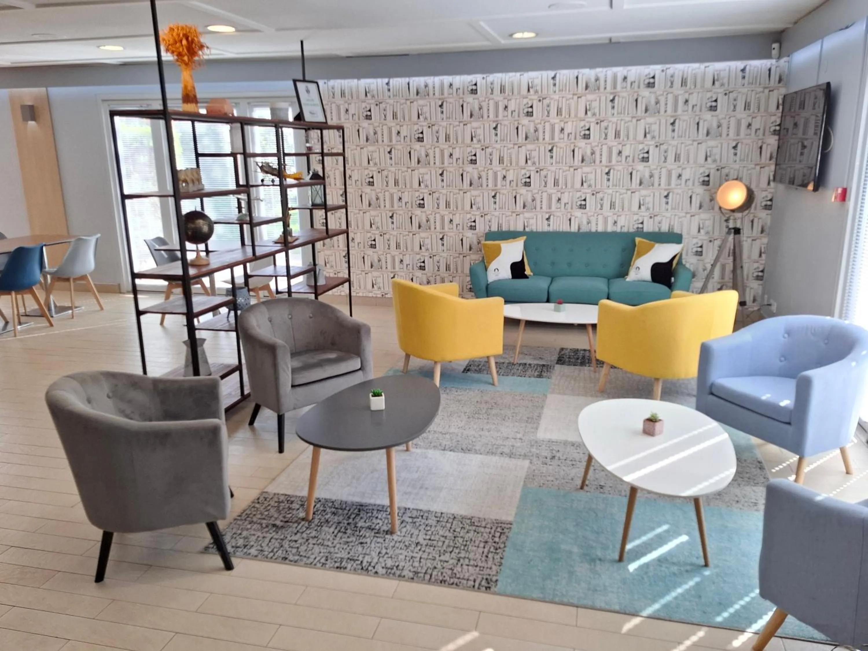 Living room in Campanile Versailles Buc