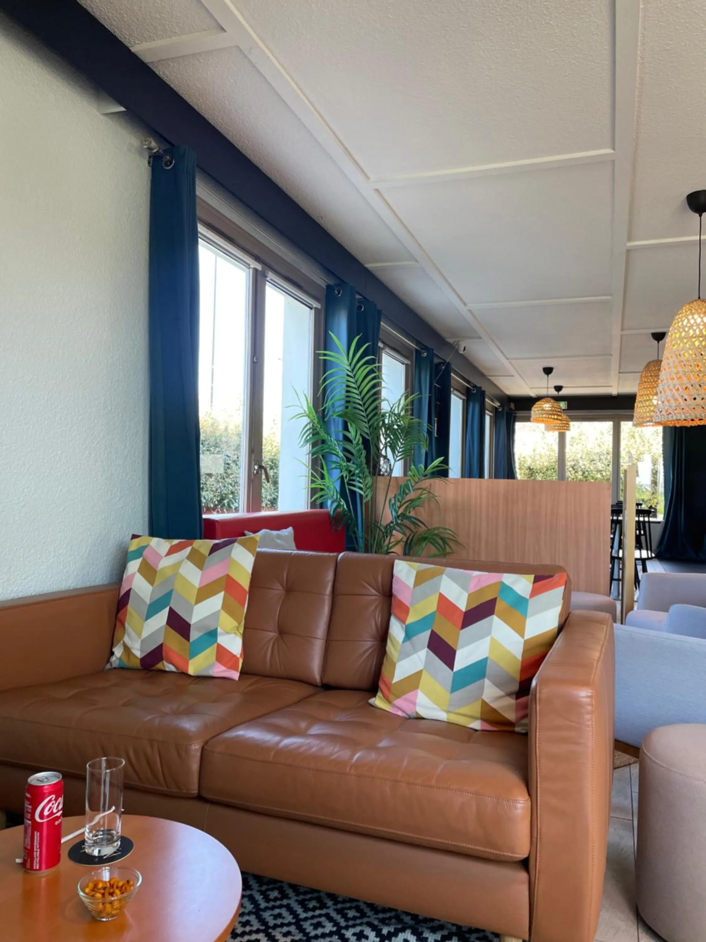 Seating area in Brit Hotel Quimper Sud