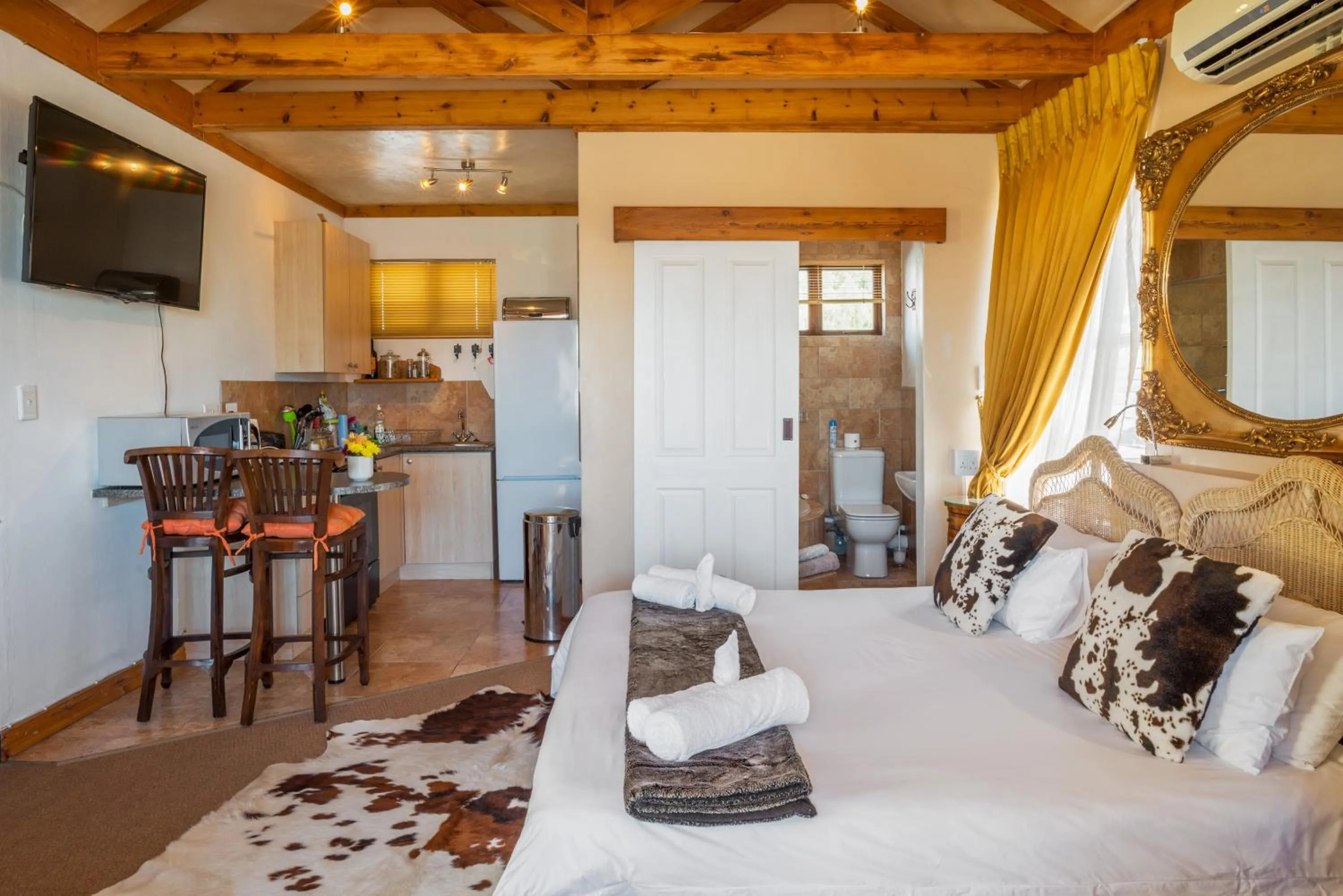 Photo of the whole room, Bed in Stadium Guest House