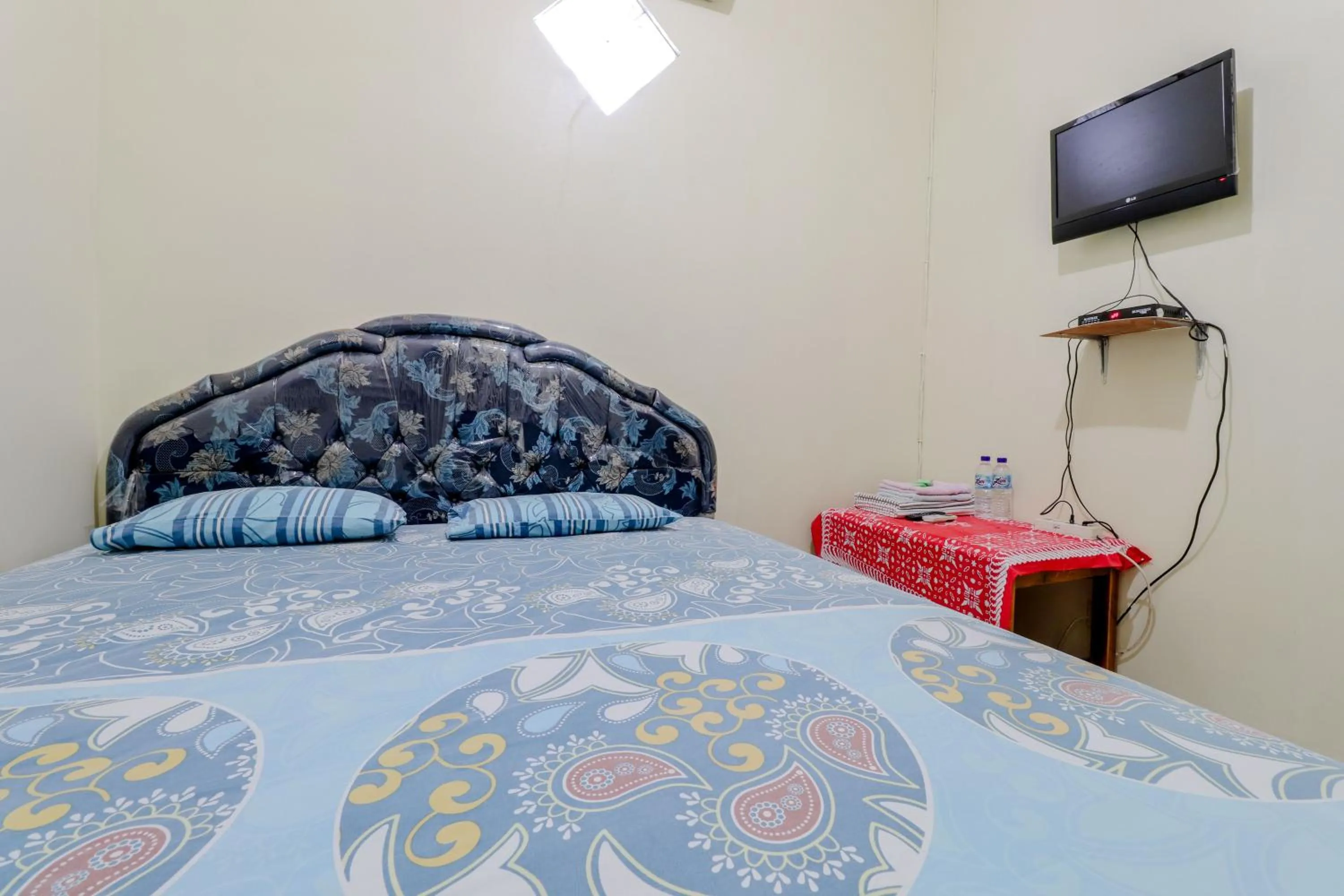 Bed in Penginapan Barokah