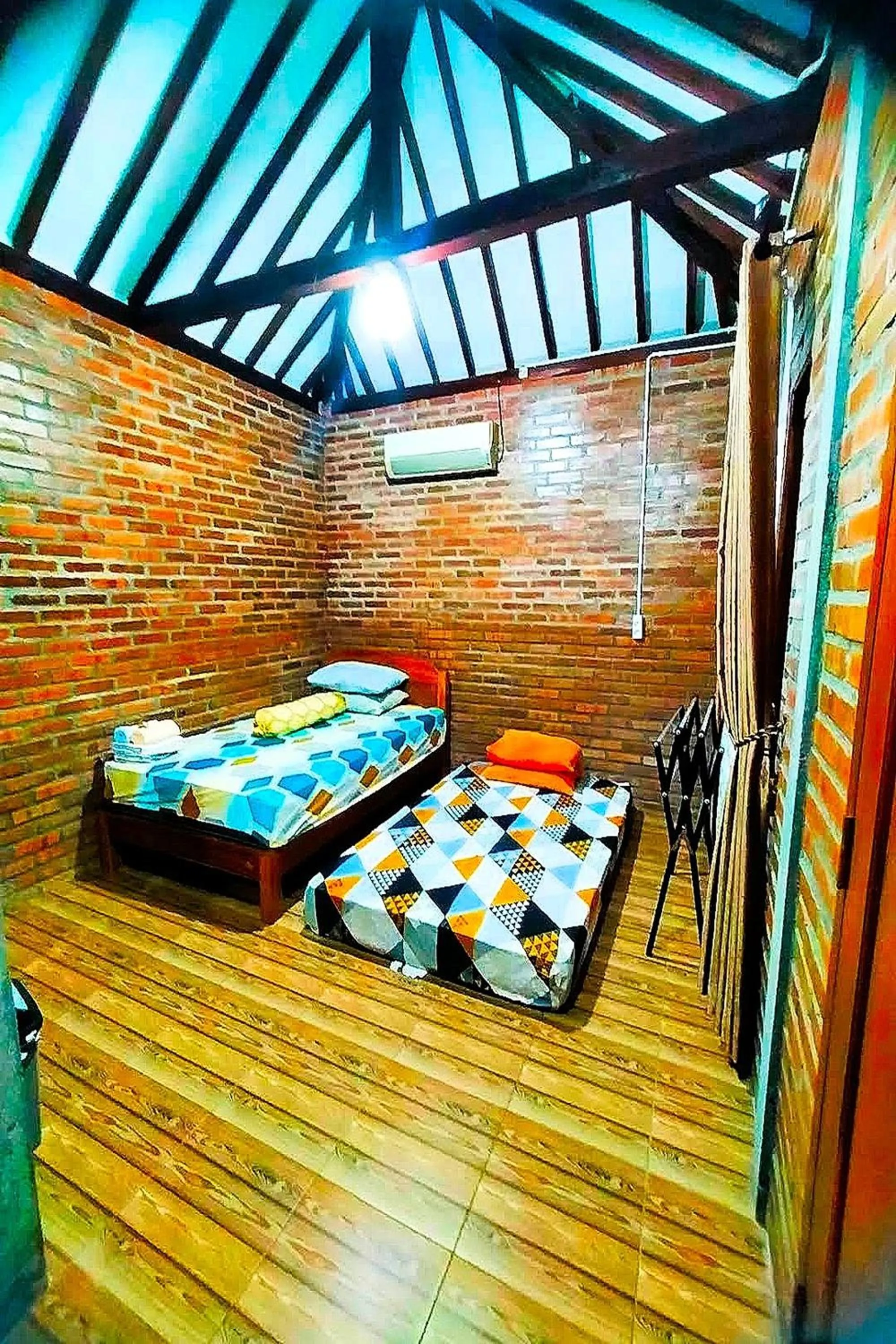 Bed in Penginapan Barokah