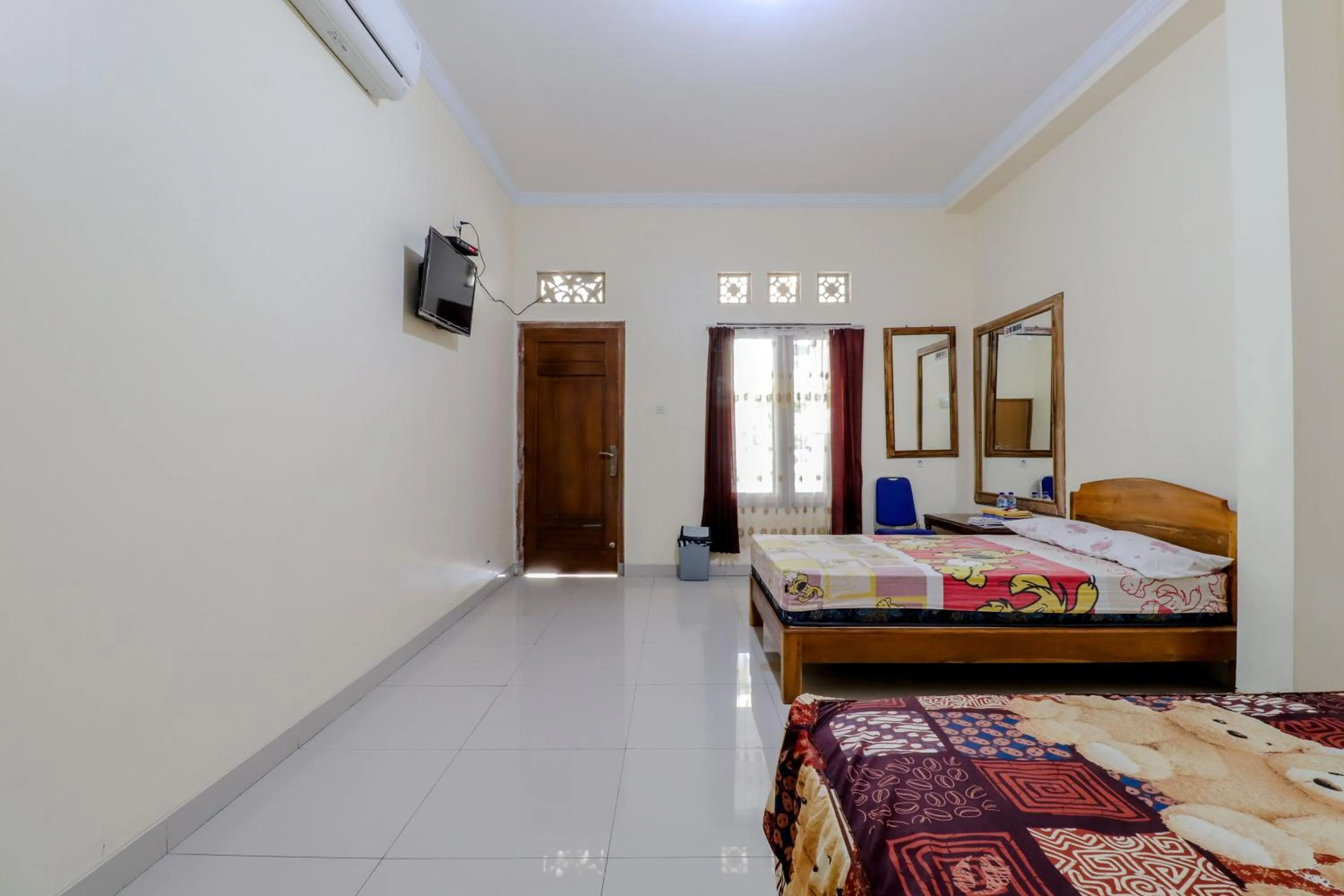 Photo of the whole room, Bed in Penginapan Barokah