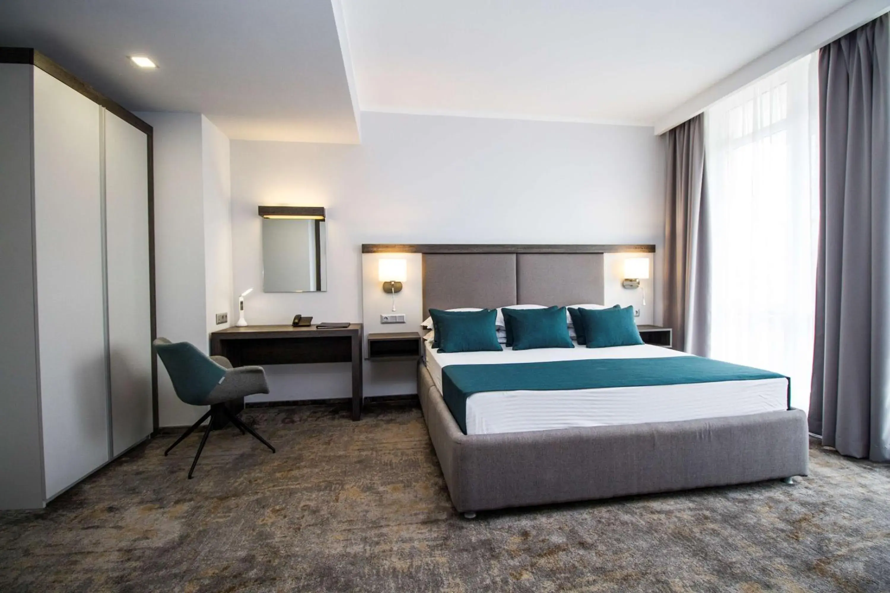 Deluxe King Room with Sofa Bed and Balcony in Best Western PLUS Premium Inn Deluxe King Room with Sofa Bed and Balcony in Best Western PLUS Premium Inn