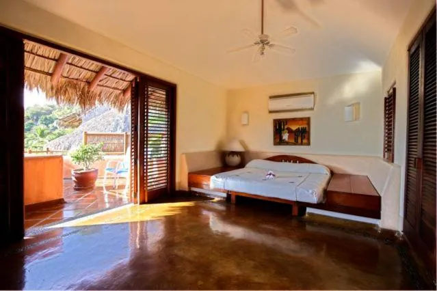 Bed in Villa Carolina Boutique Hotel ADULTS ONLY