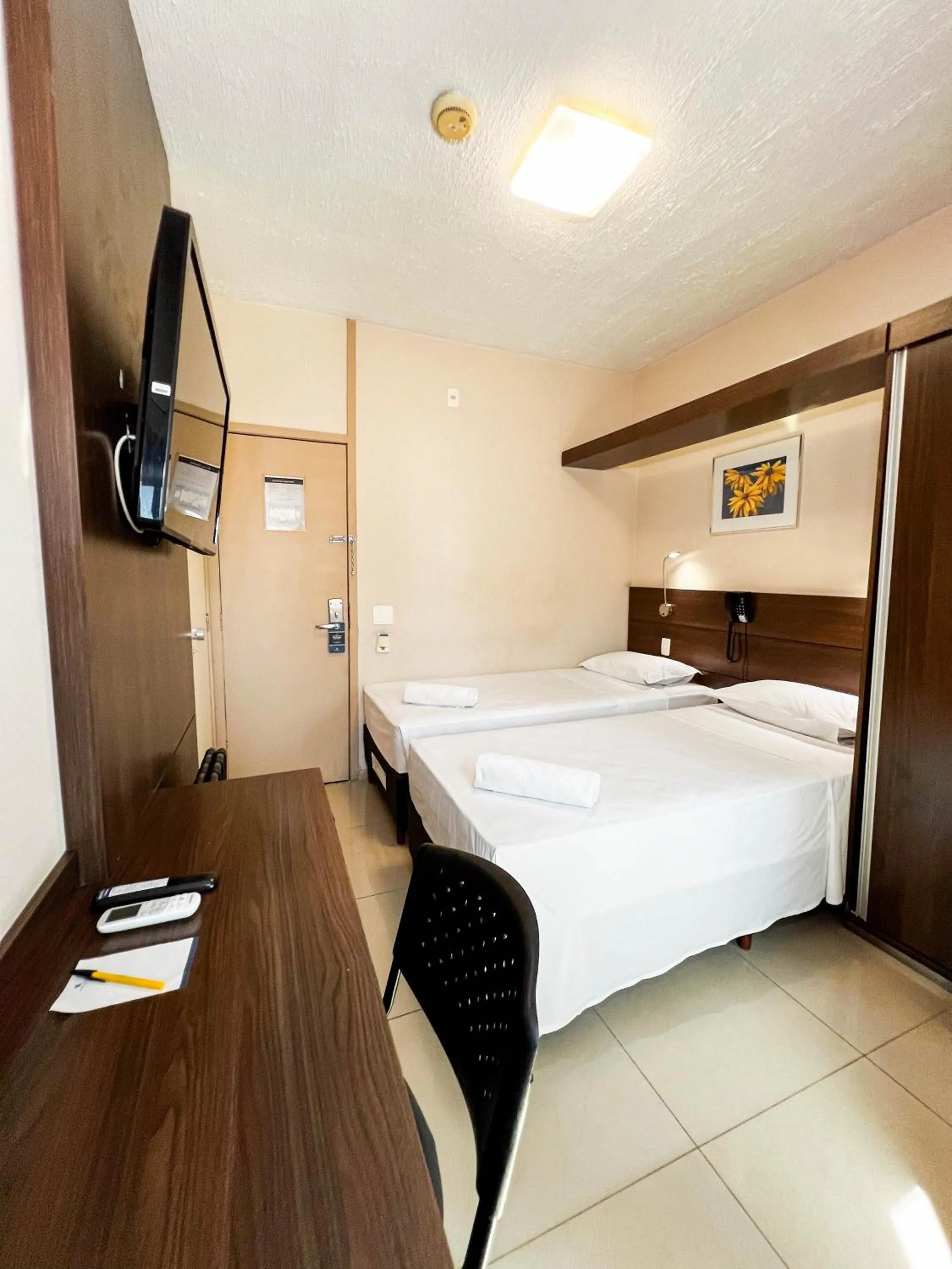 Bed in Royal Center Hotel Lourdes