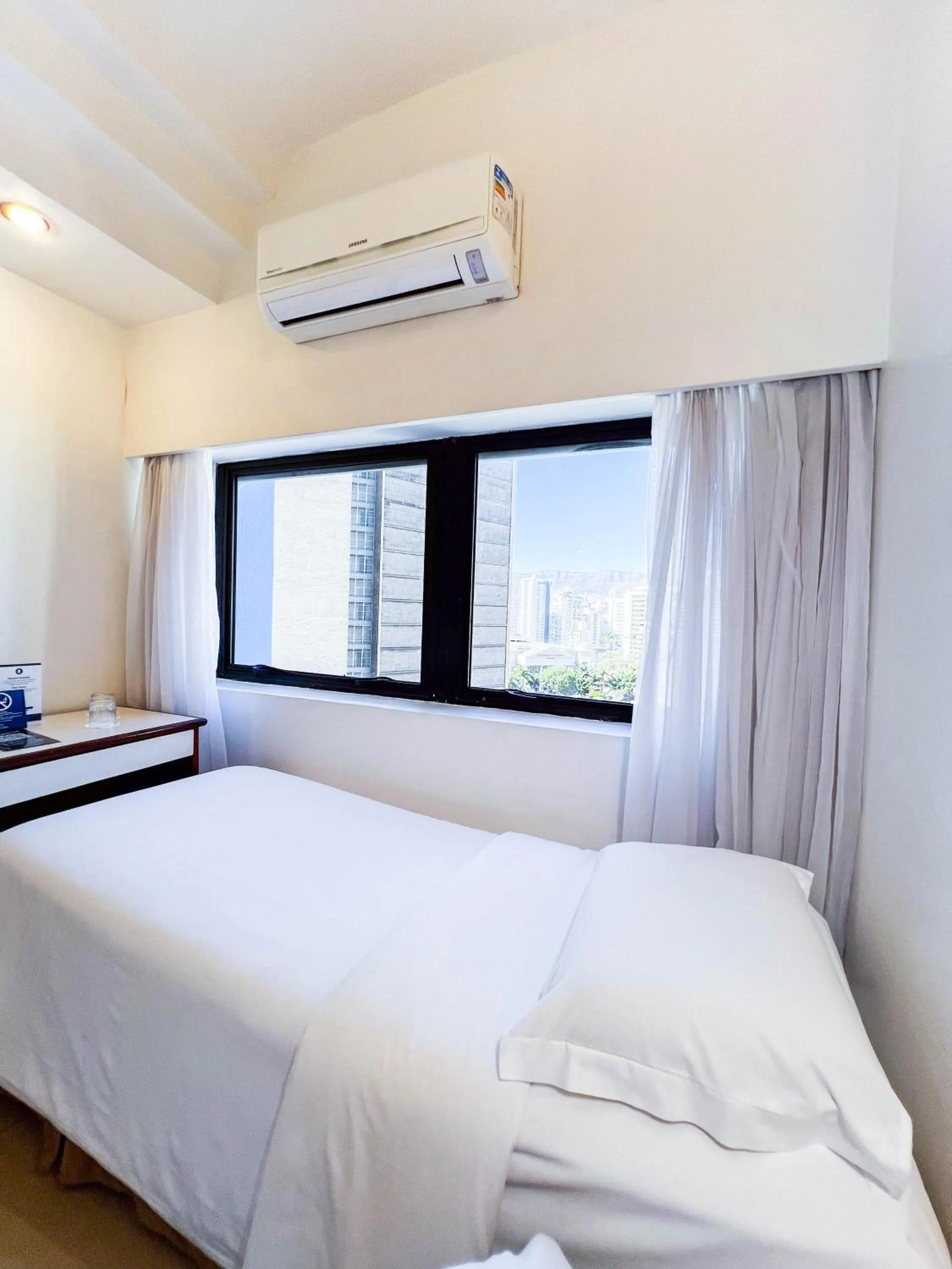 Bed in Royal Center Hotel Lourdes