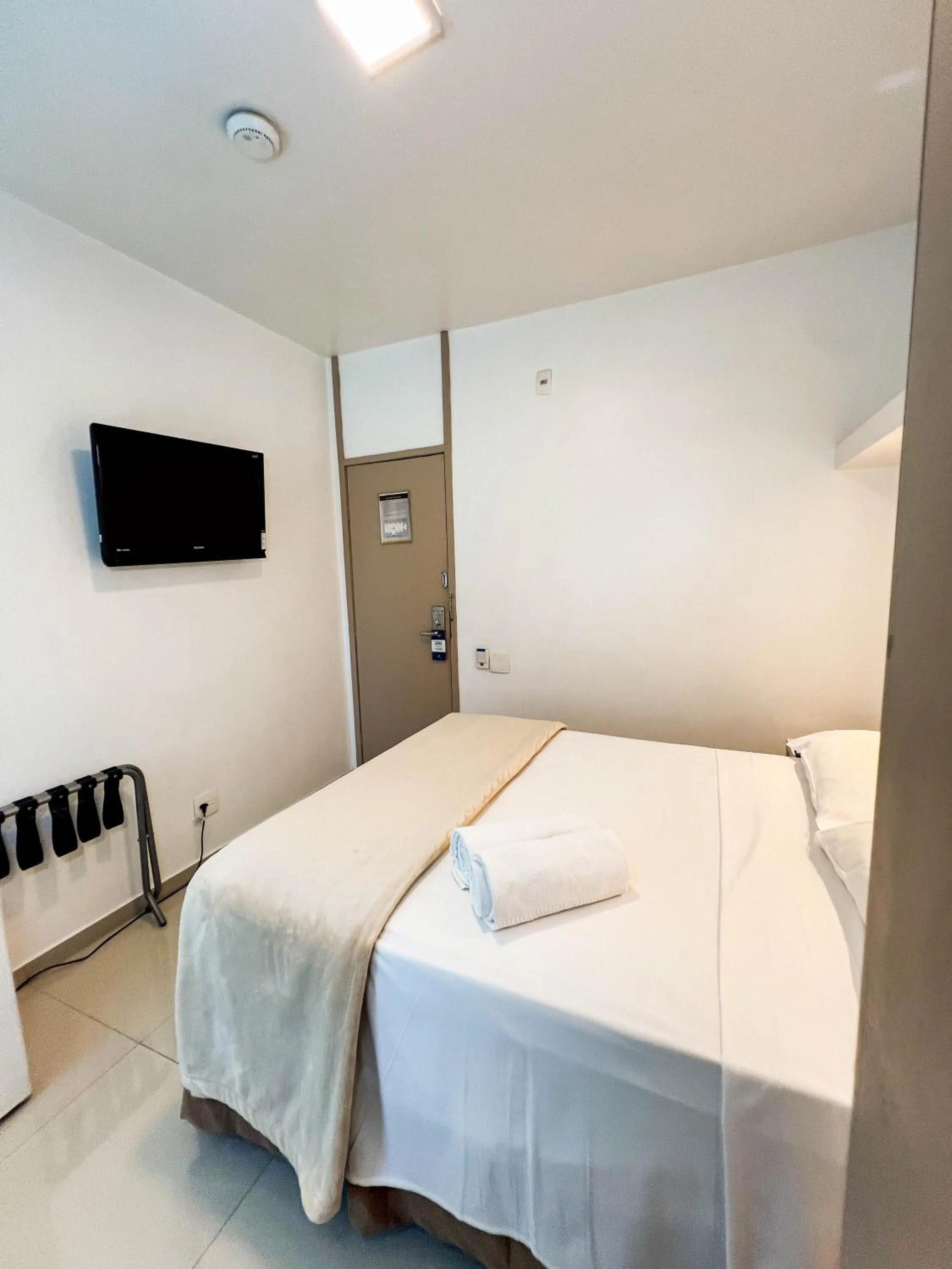 Bed in Royal Center Hotel Lourdes