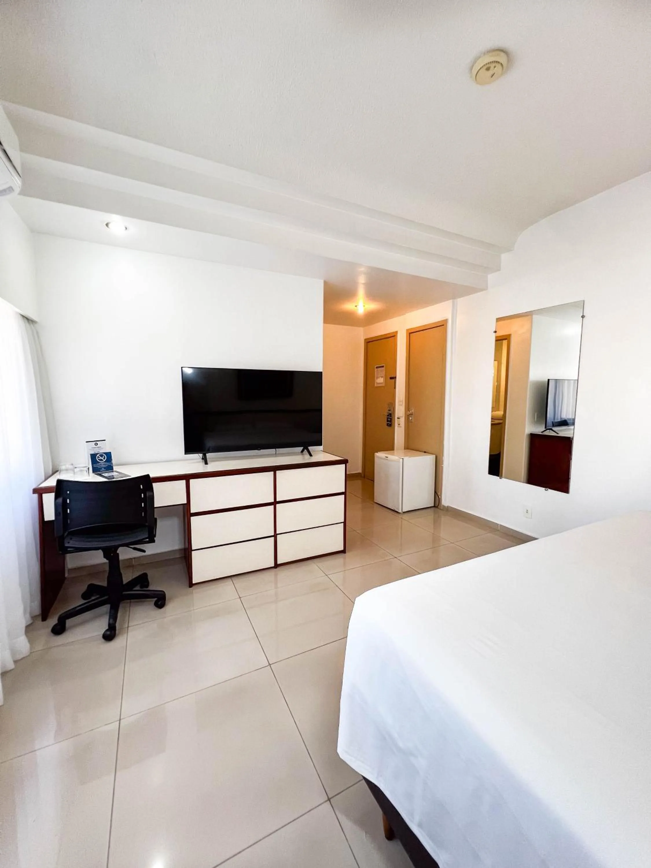 Bed in Royal Center Hotel Lourdes