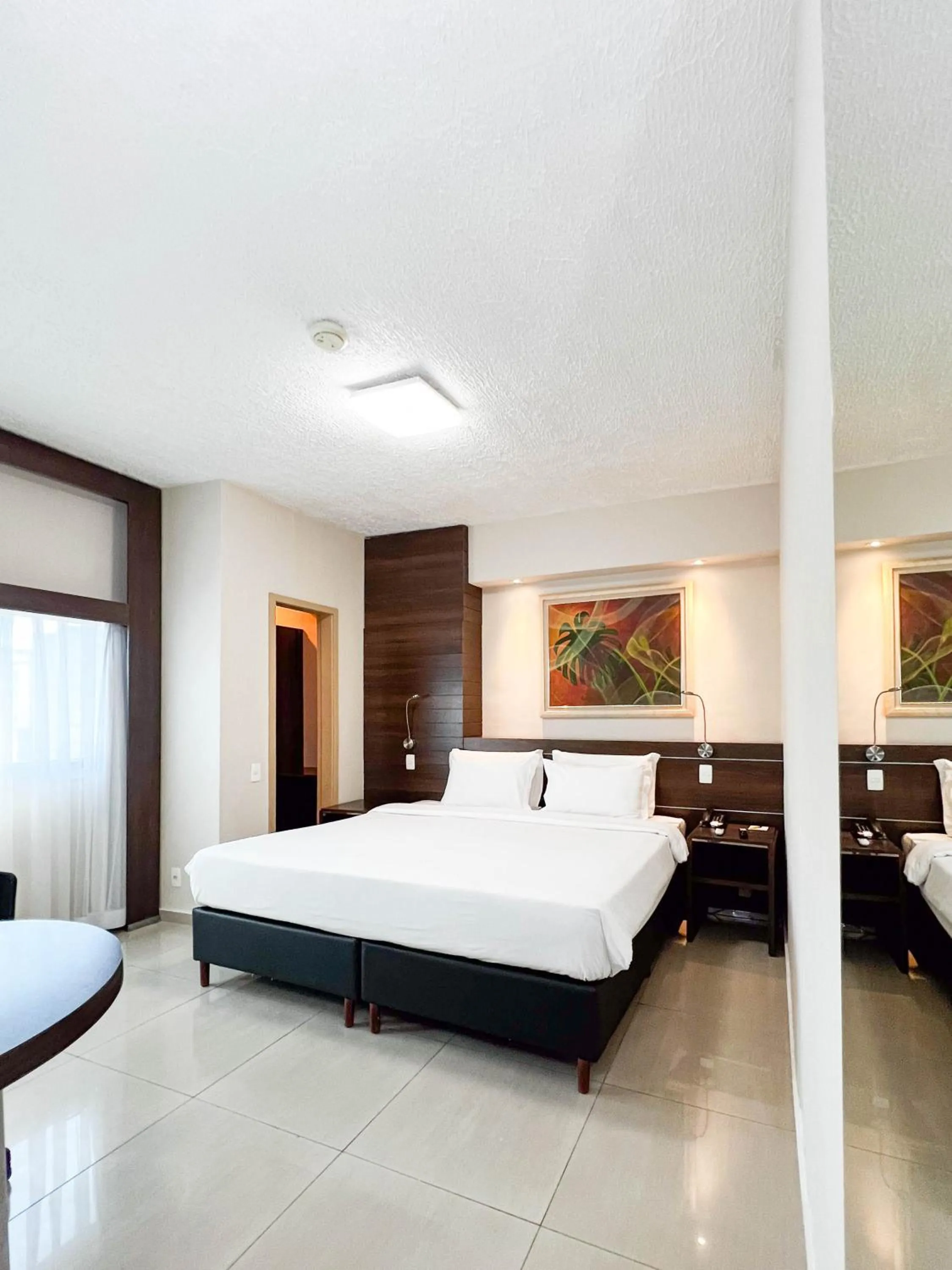 Bed in Royal Center Hotel Lourdes