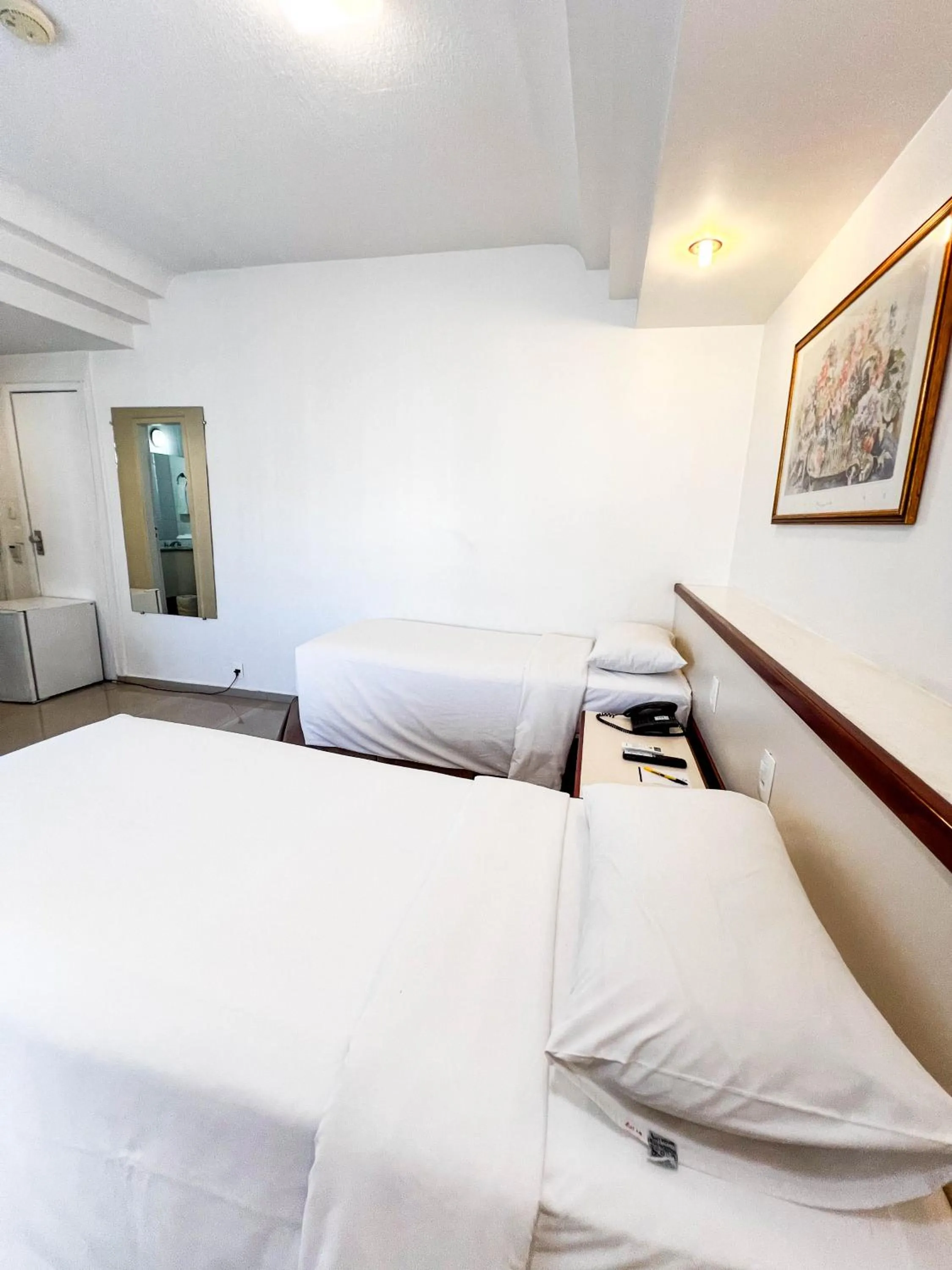 Bed in Royal Center Hotel Lourdes