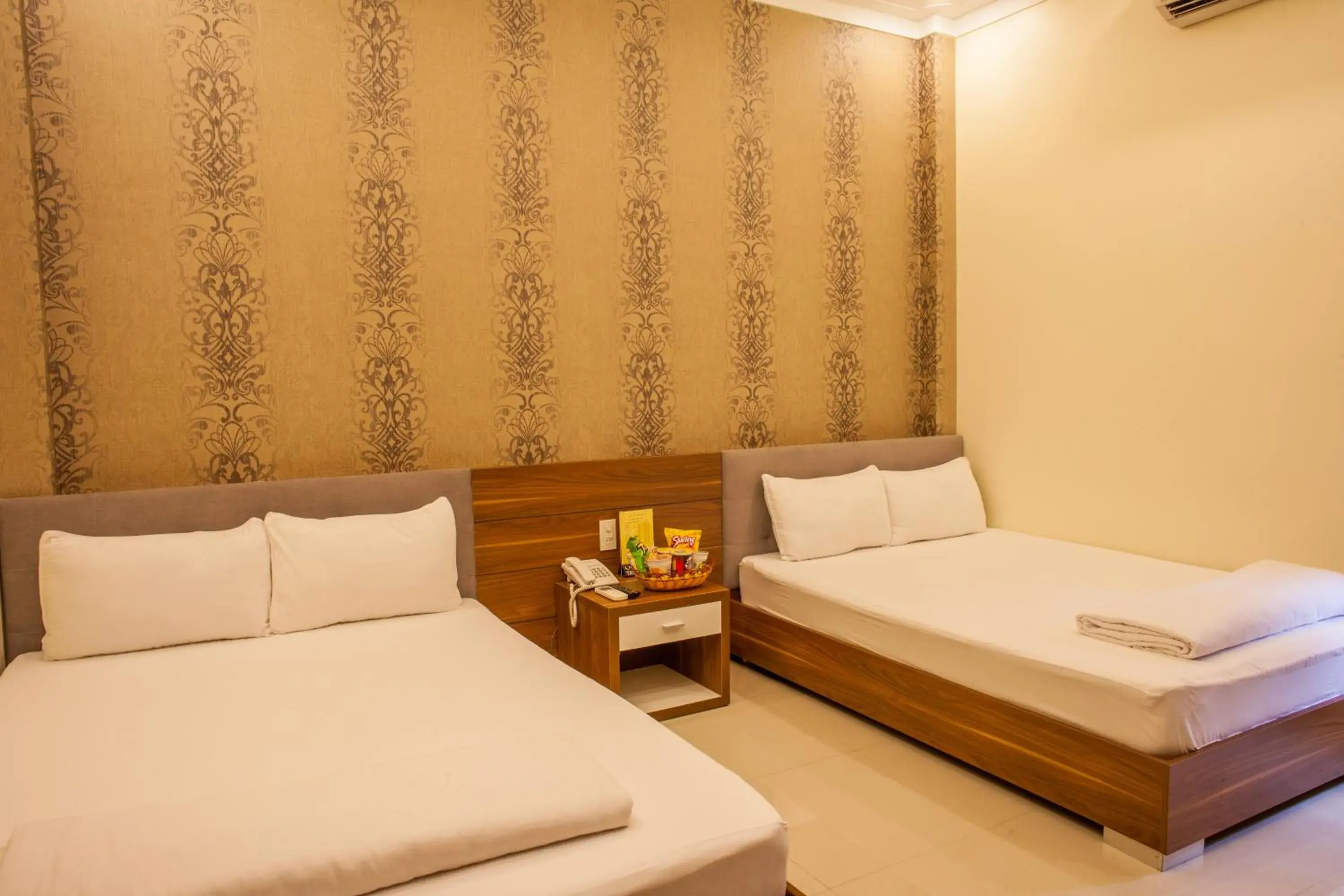 Superior Queen Room with Two Queen Beds in Trieu Khang Hotel gần sân bay Cam Ranh near Cam Ranh Airport Superior Queen Room with Two Queen Beds in Trieu Khang Hotel gần sân bay Cam Ranh near Cam Ranh Airport