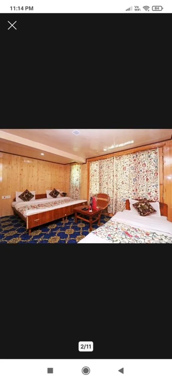 Bed in Hotel Bright Palace