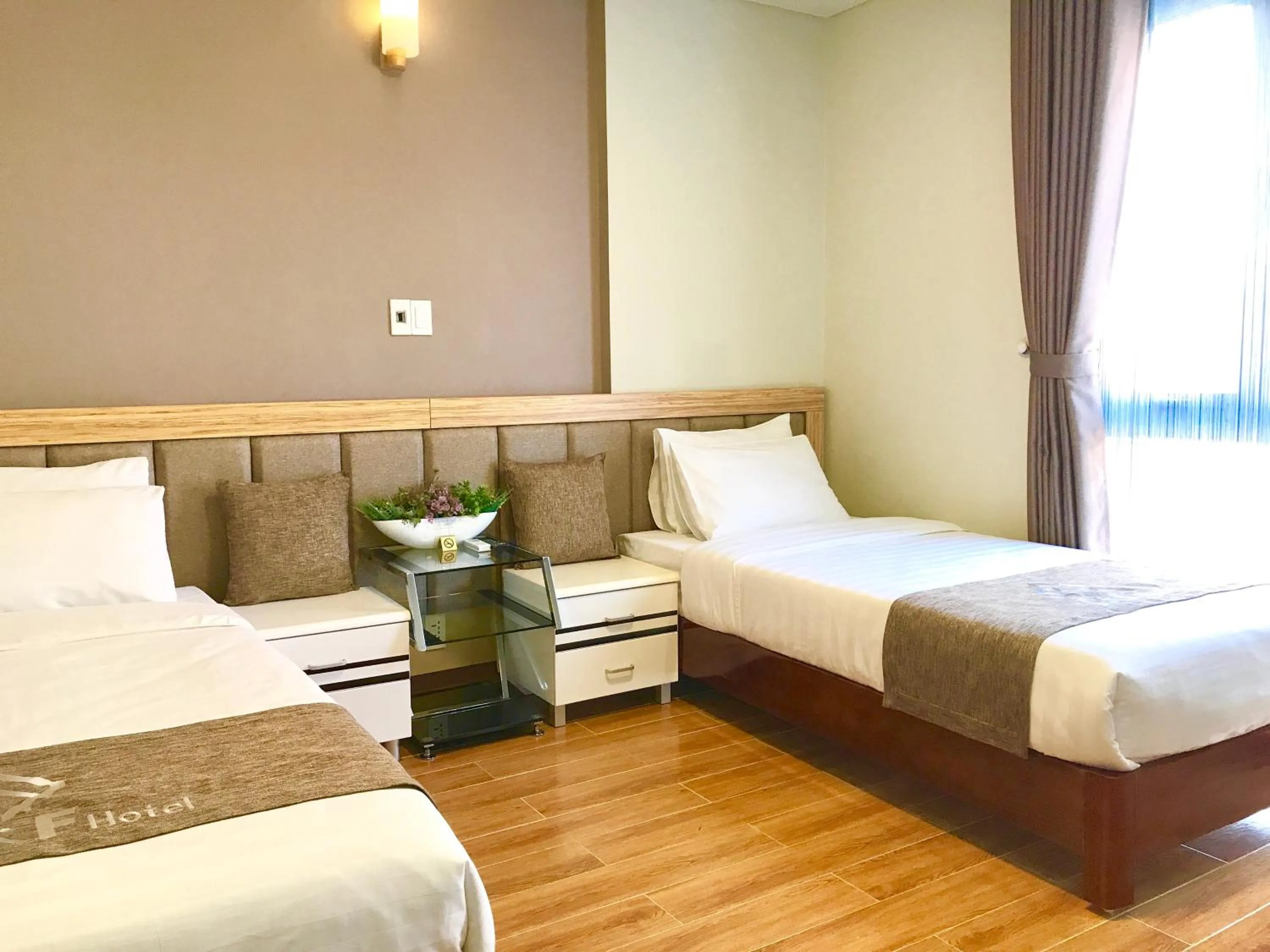 Photo of the whole room, Bed in F & F Hotel