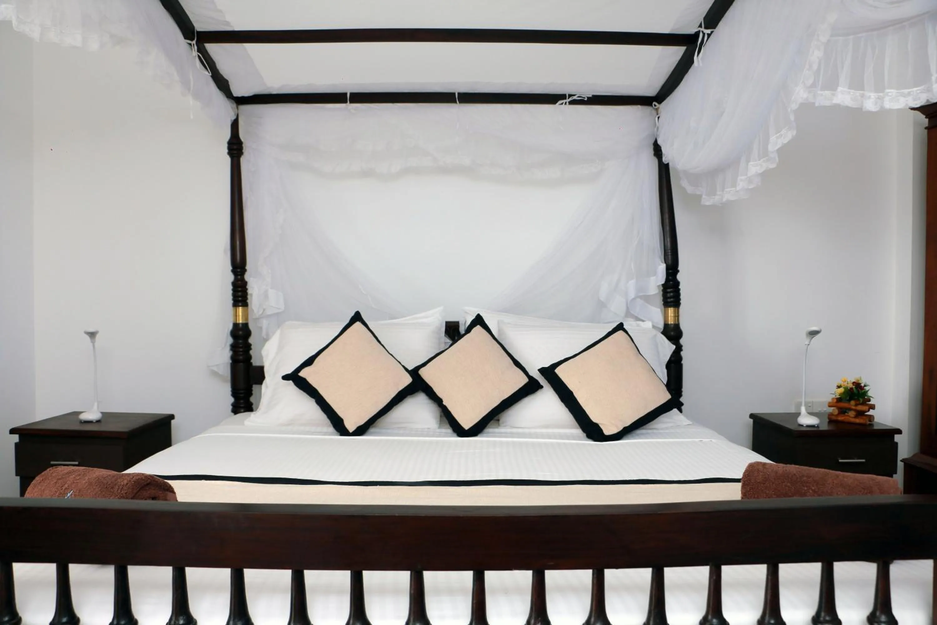 Bed in Mirissa Gate Resort