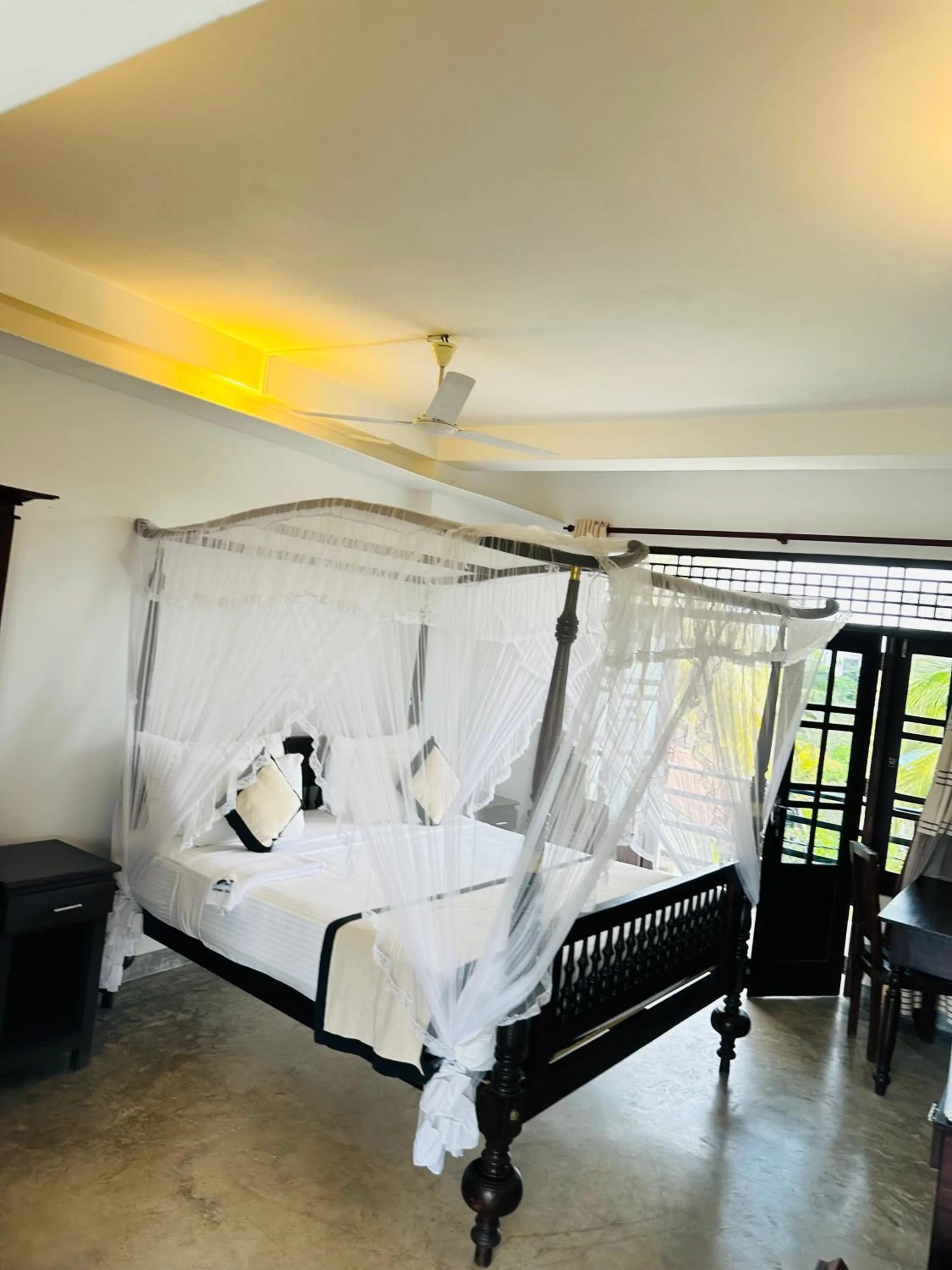 Bed in Mirissa Gate Resort