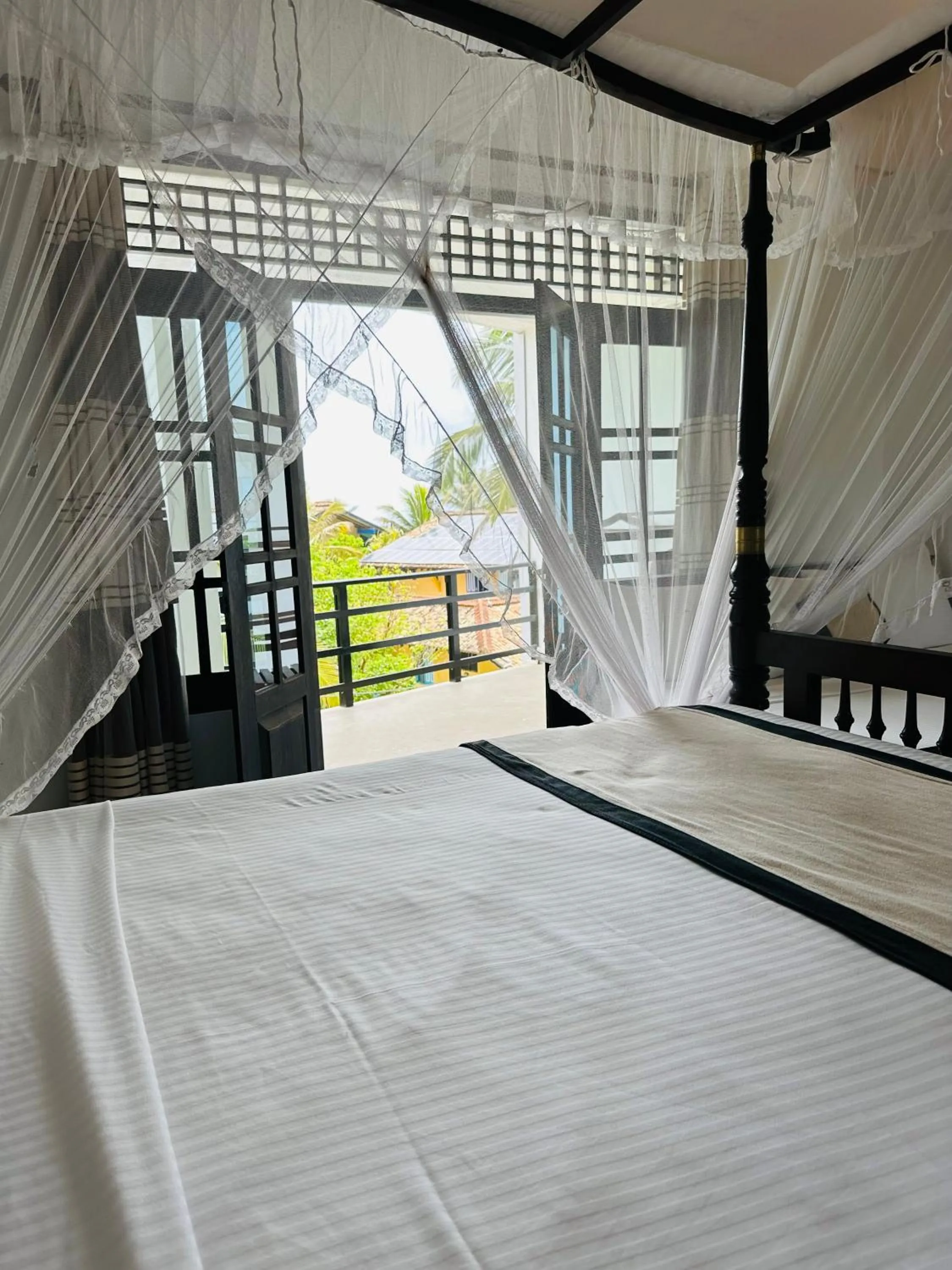 View (from property/room), Bed in Mirissa Gate Resort