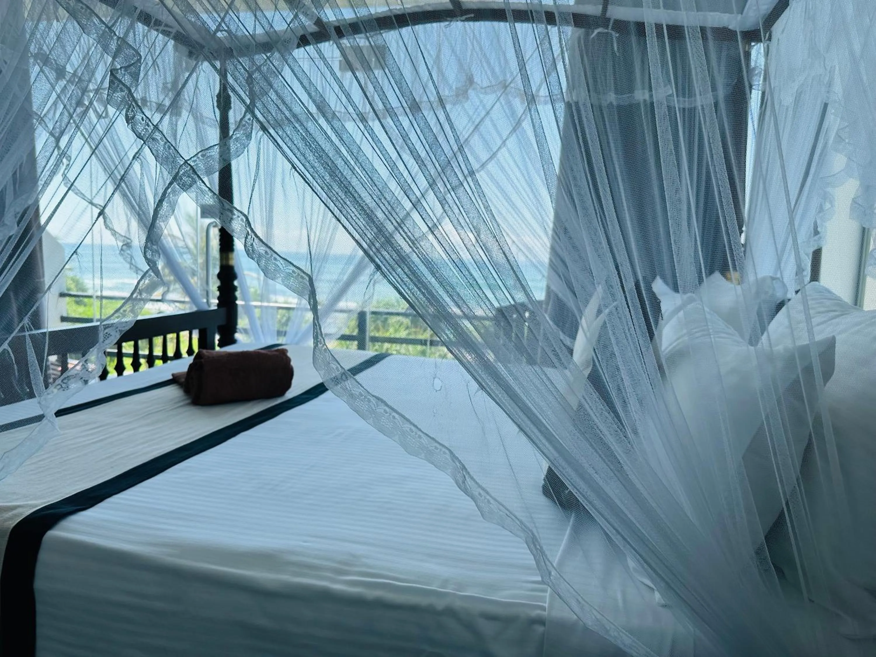 Bed in Mirissa Gate Resort