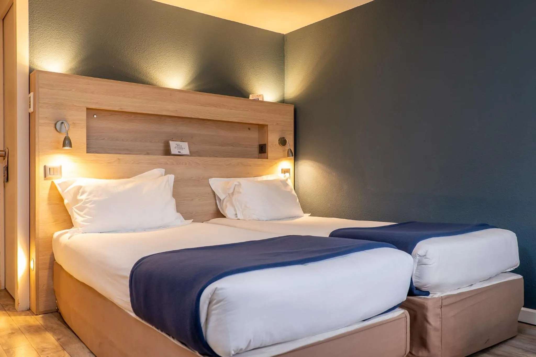 Bed in Kyriad Digne-Les-Bains