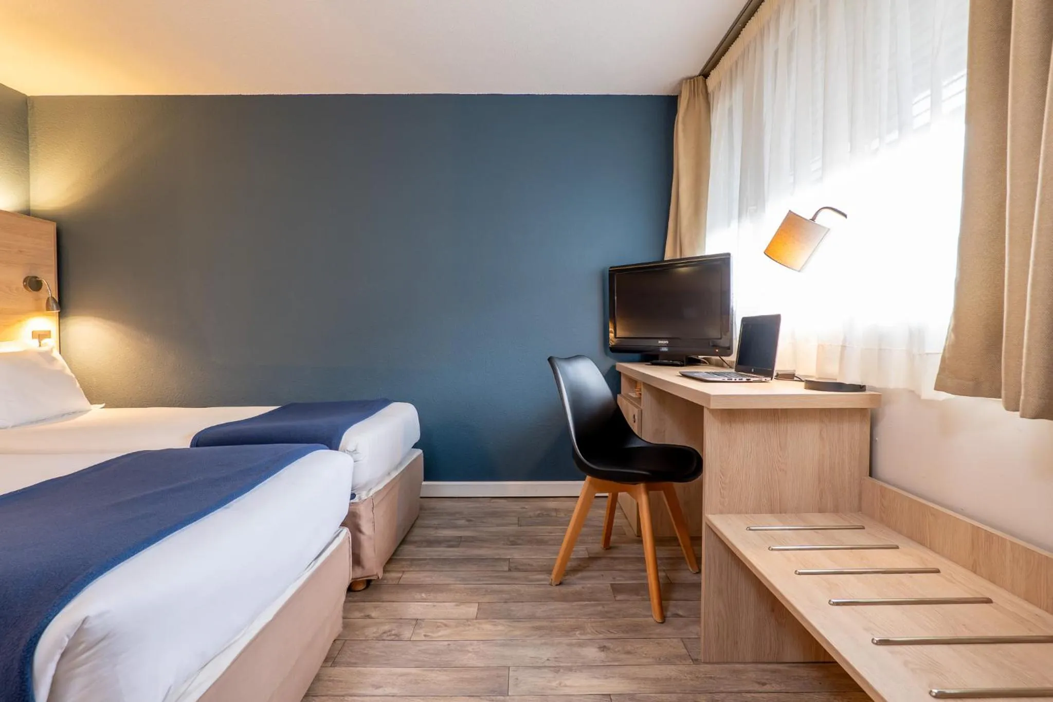 Bed in Kyriad Digne-Les-Bains