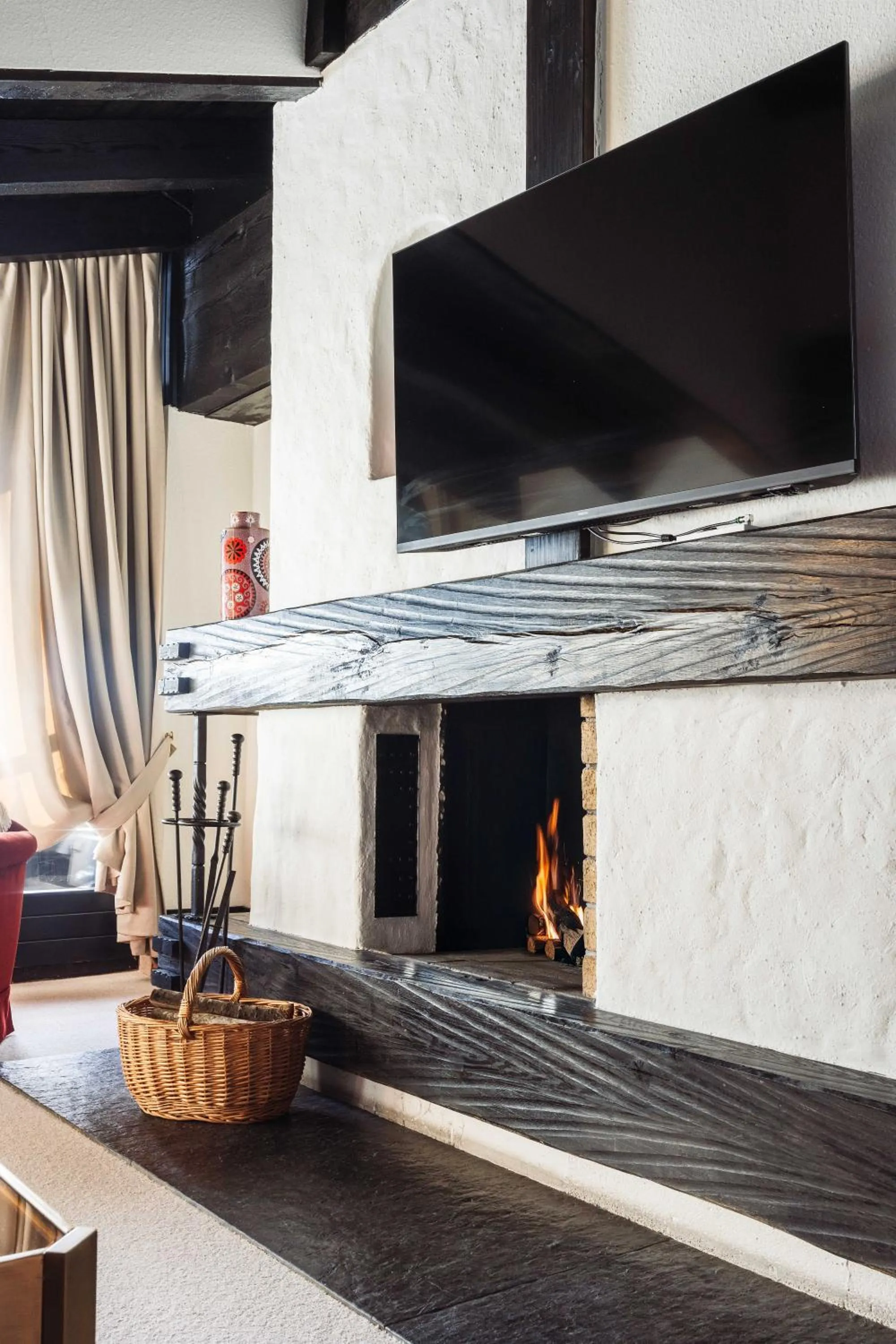 fireplace in A-ROSA Hotel Thurnher's Alpenhof