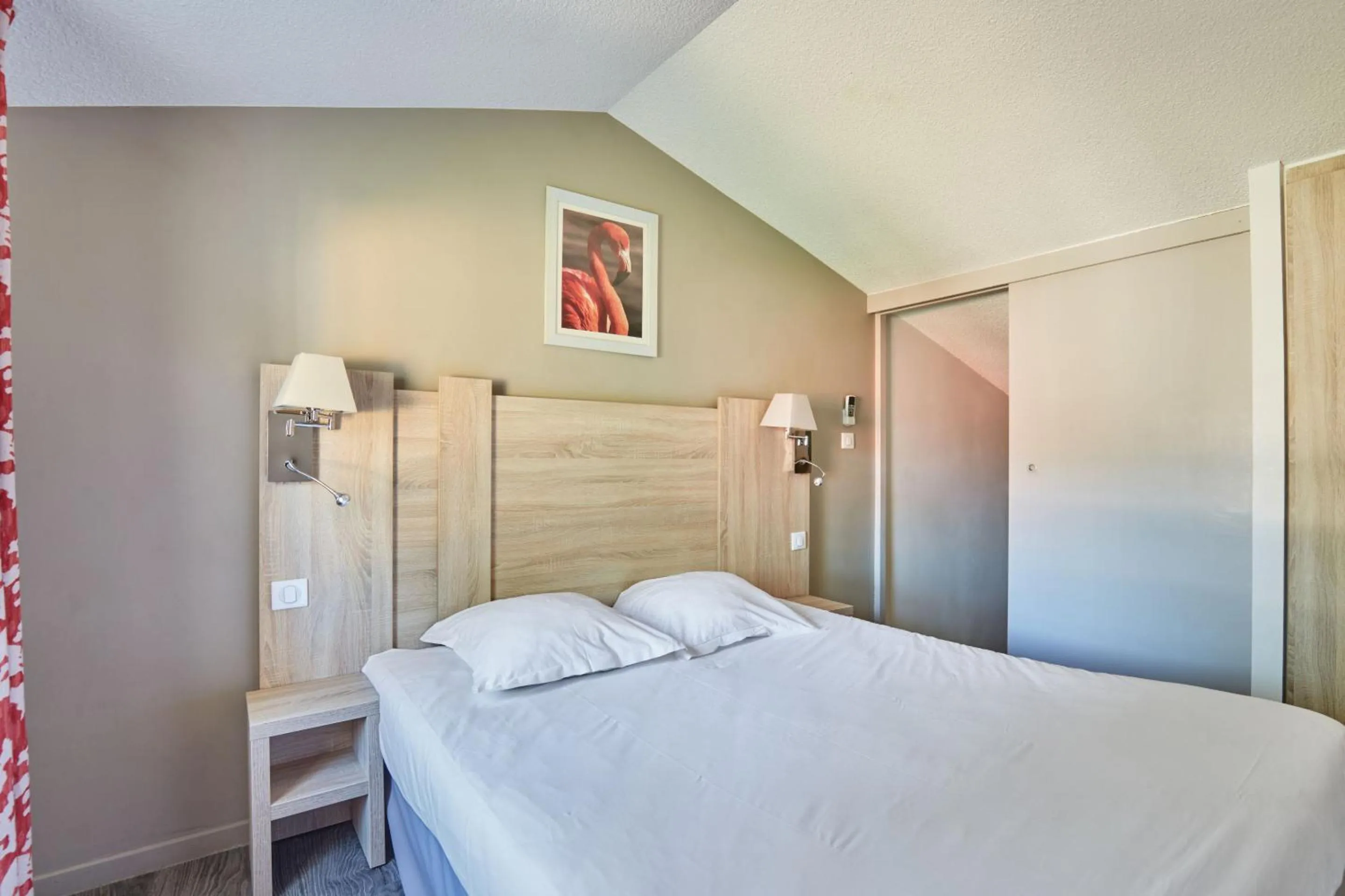 Bedroom, Bed in Résidence Odalys Le Village Camarguais Les Gardians